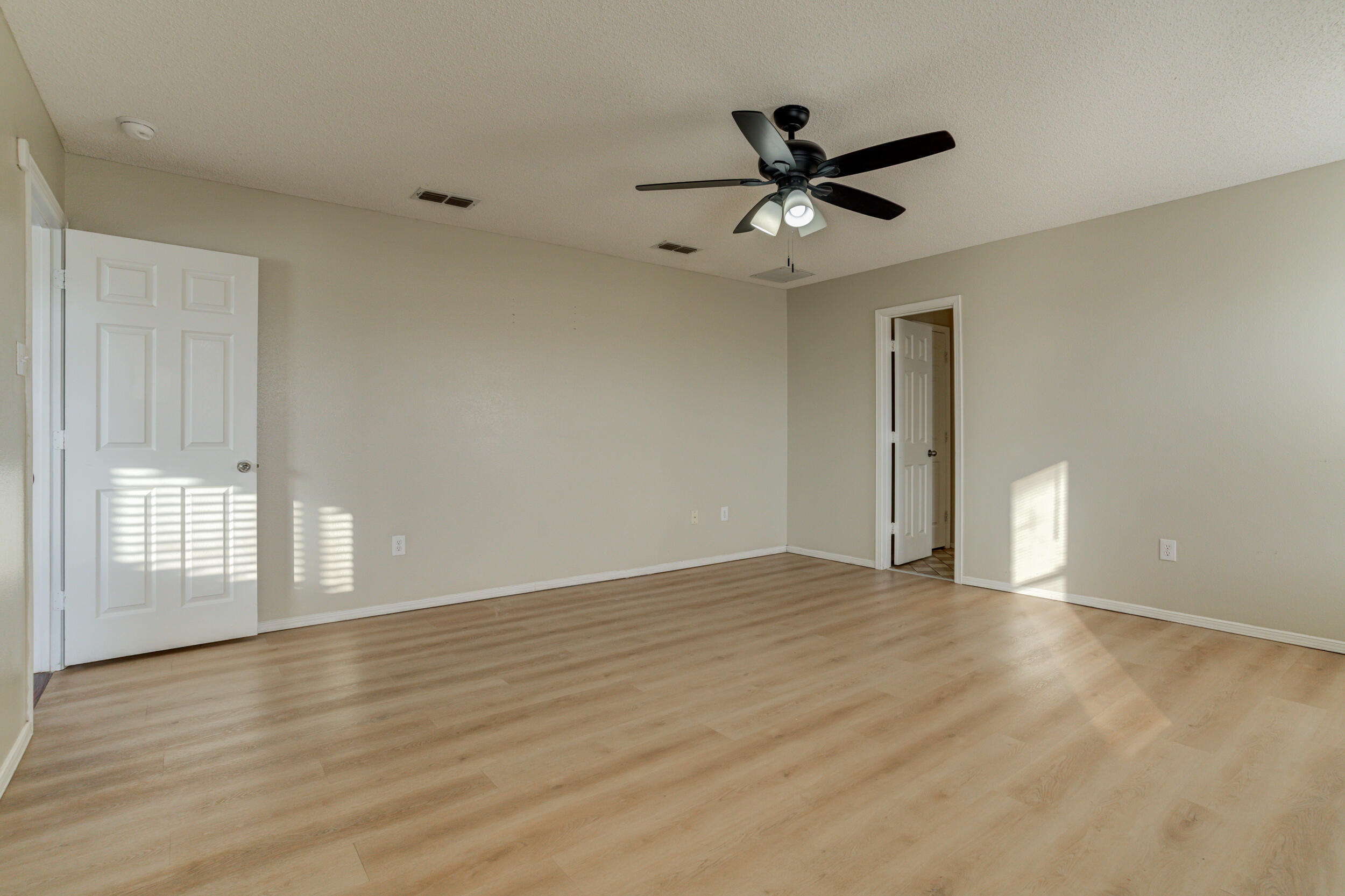 6221 18th Street Lubbock, TX 79416 - Photo 29 of 48 a view of an empty room with a window