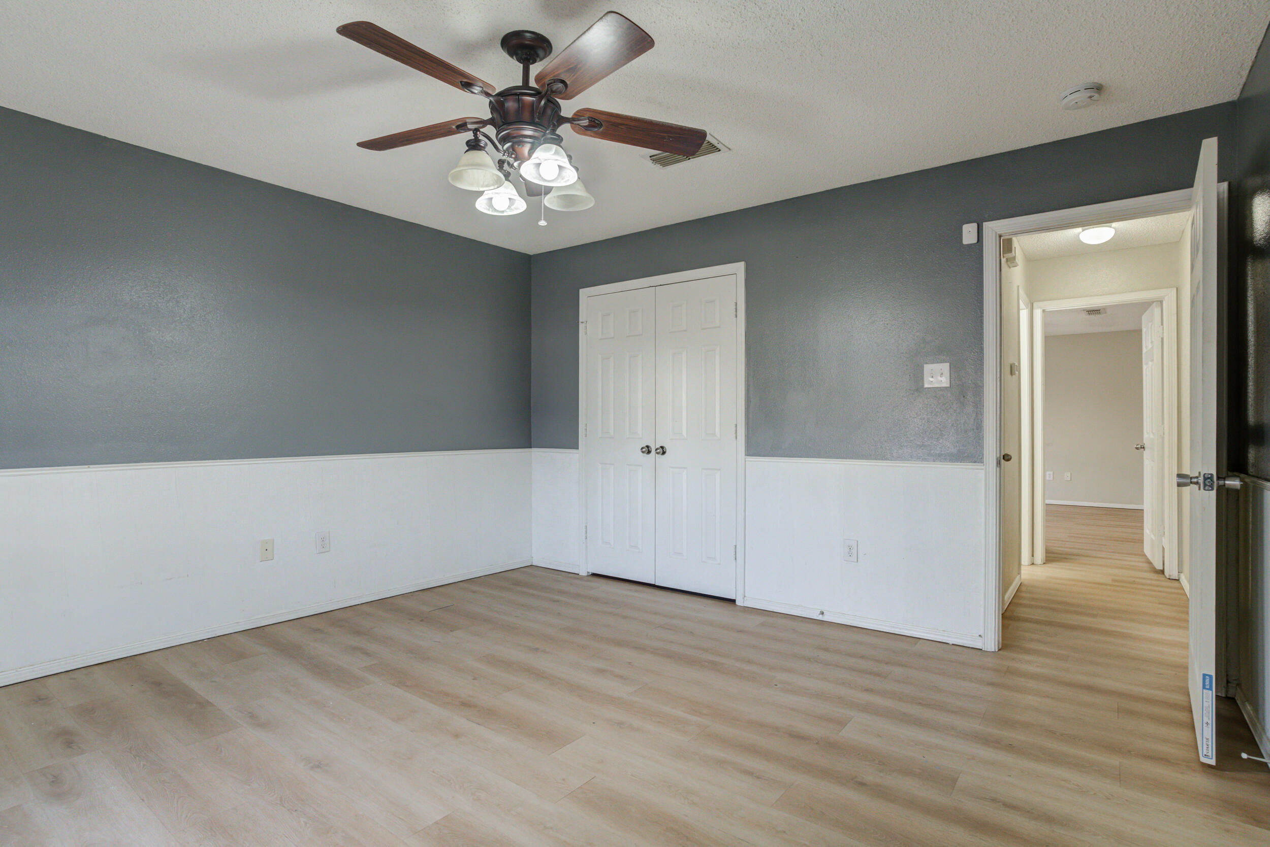 6221 18th Street Lubbock, TX 79416 - Photo 40 of 48 wooden floor in an empty room