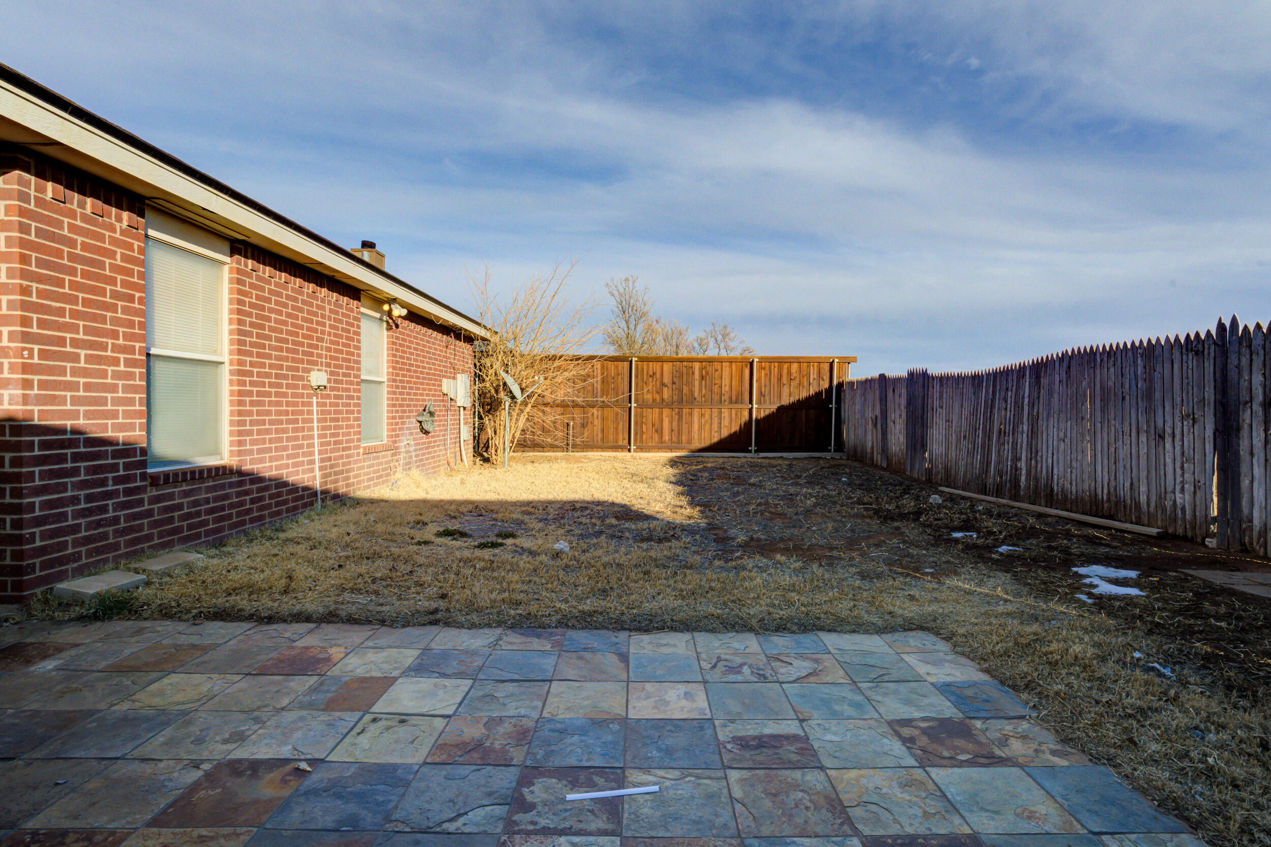 6221 18th Street Lubbock, TX 79416 - Photo 46 of 48 a view of a backyard