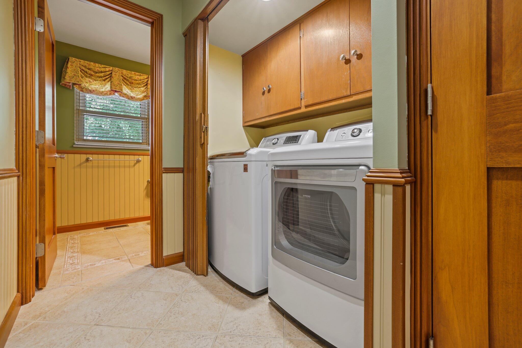 19940 Collins Road Marysville, OH 43040 - Photo 24 of 53 1st Floor Laundry w/accordion doors