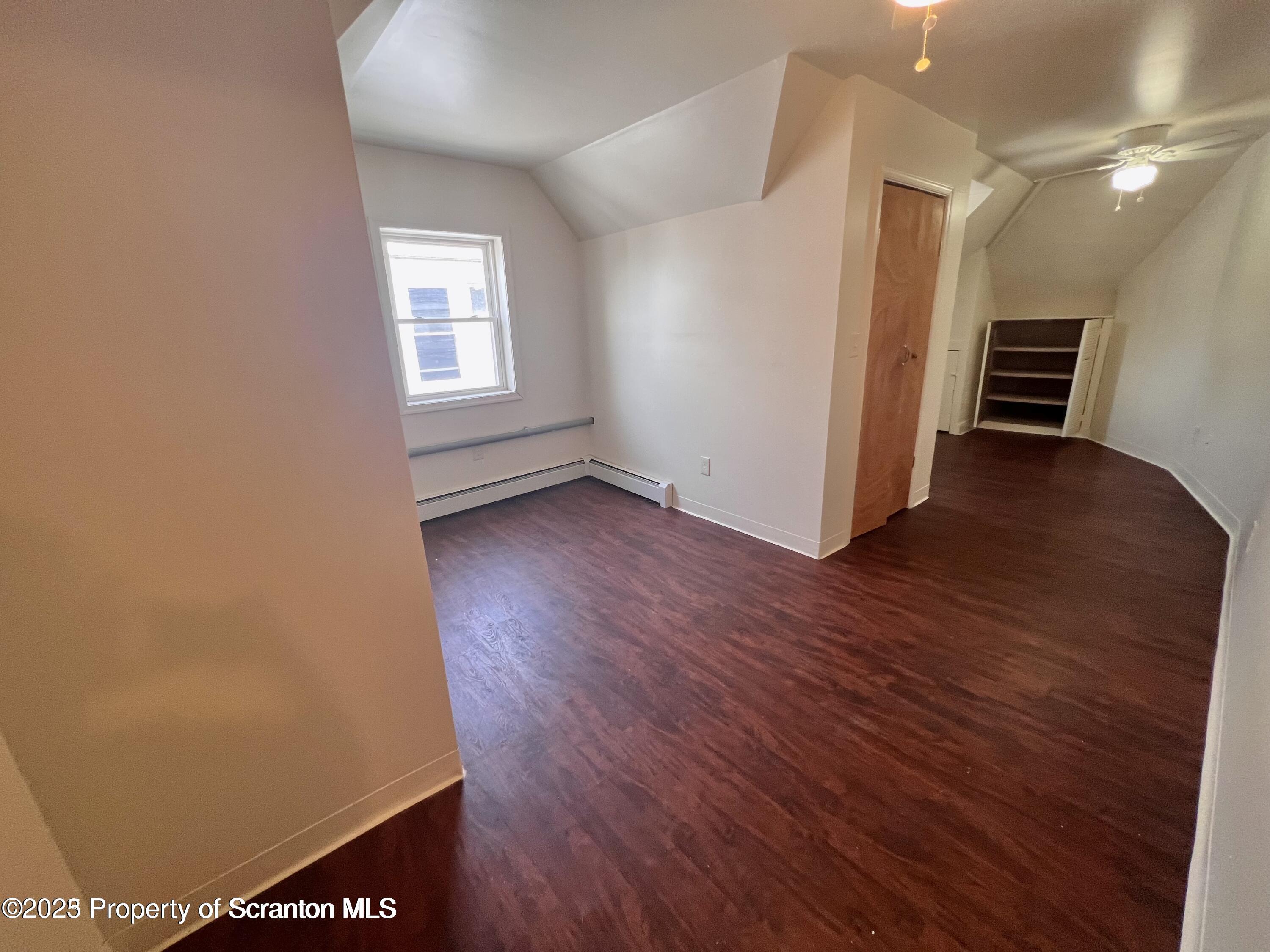1930 Boulevard Avenue, Unit 3 Scranton, PA 18509 - Photo 5 of 8 a view of a hallway with wooden floor