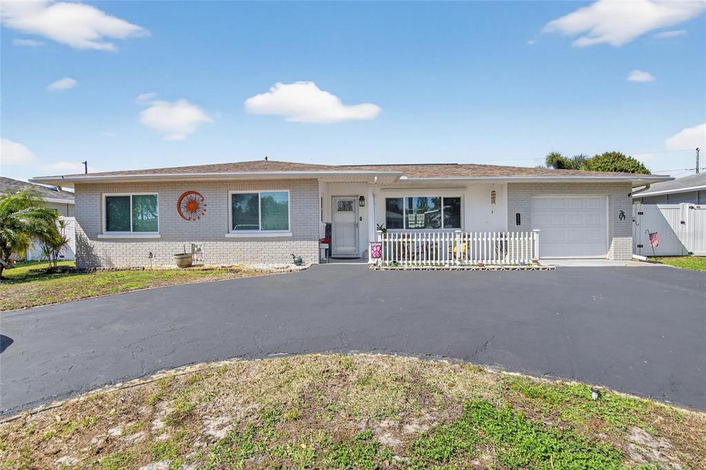 4990 99th Street North St. Petersburg, FL 33708 - Photo 1 of 1 a house view with a outdoor space