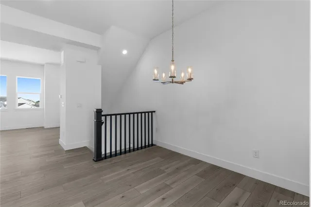 a bathroom with a sink a mirror and toilet