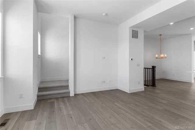 an empty room with a bench