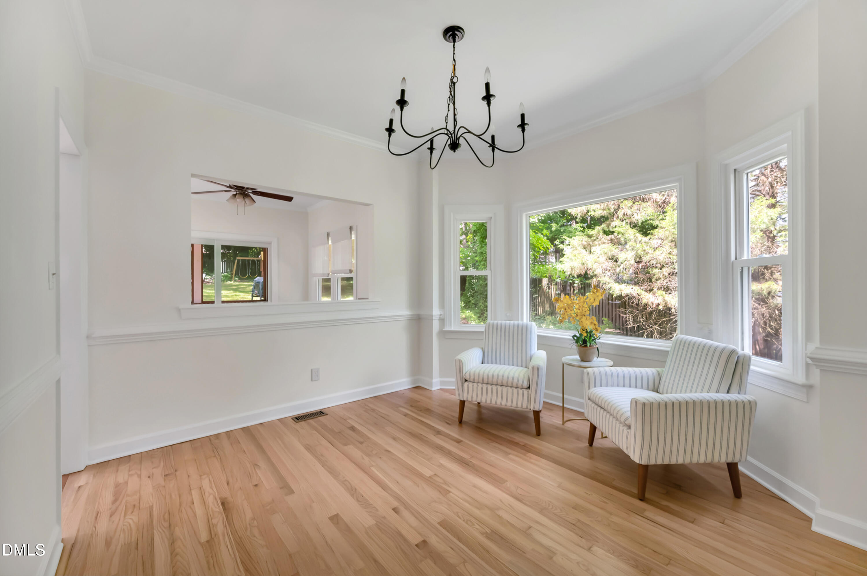 7500 Drayton Court Raleigh, NC 27615 - Photo 5 of 27 a view of a livingroom with furniture window and wooden floor