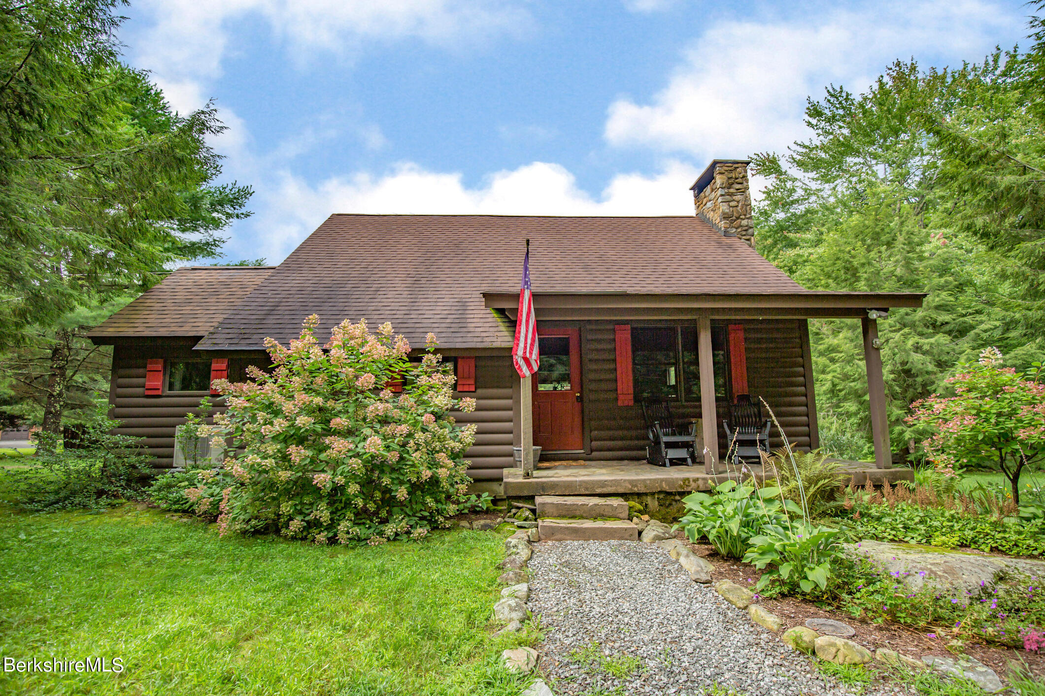 43 Becket Road Otis, MA 01029 - Photo 2 of 41 a view of a house with garden