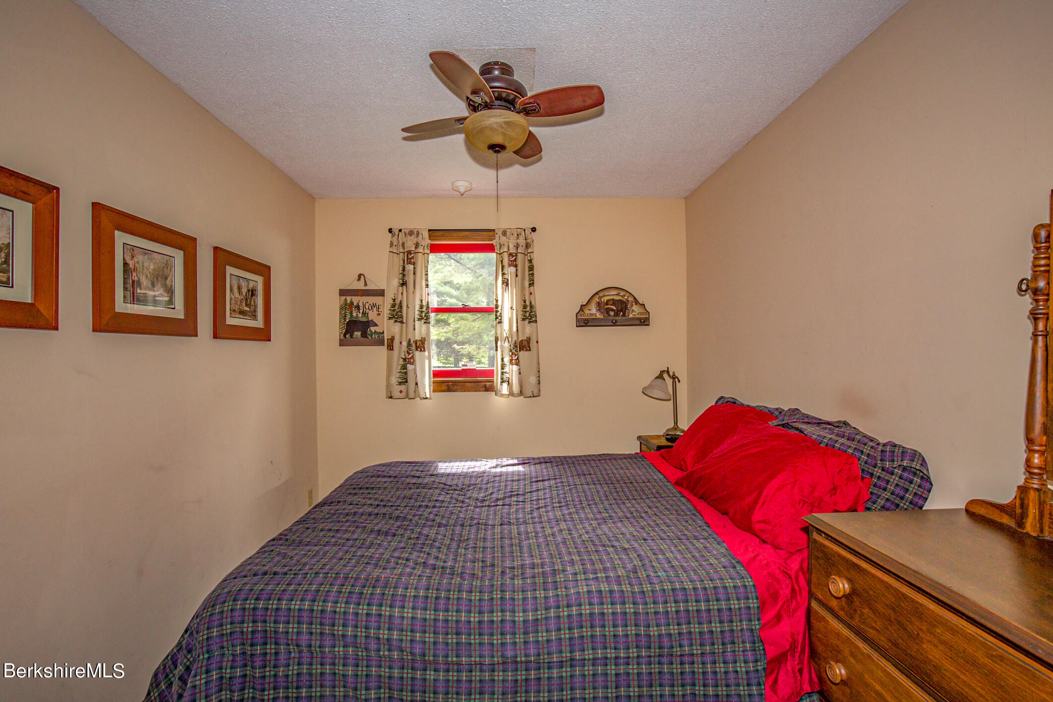 43 Becket Road Otis, MA 01029 - Photo 16 of 41 a bedroom with a bed and a window