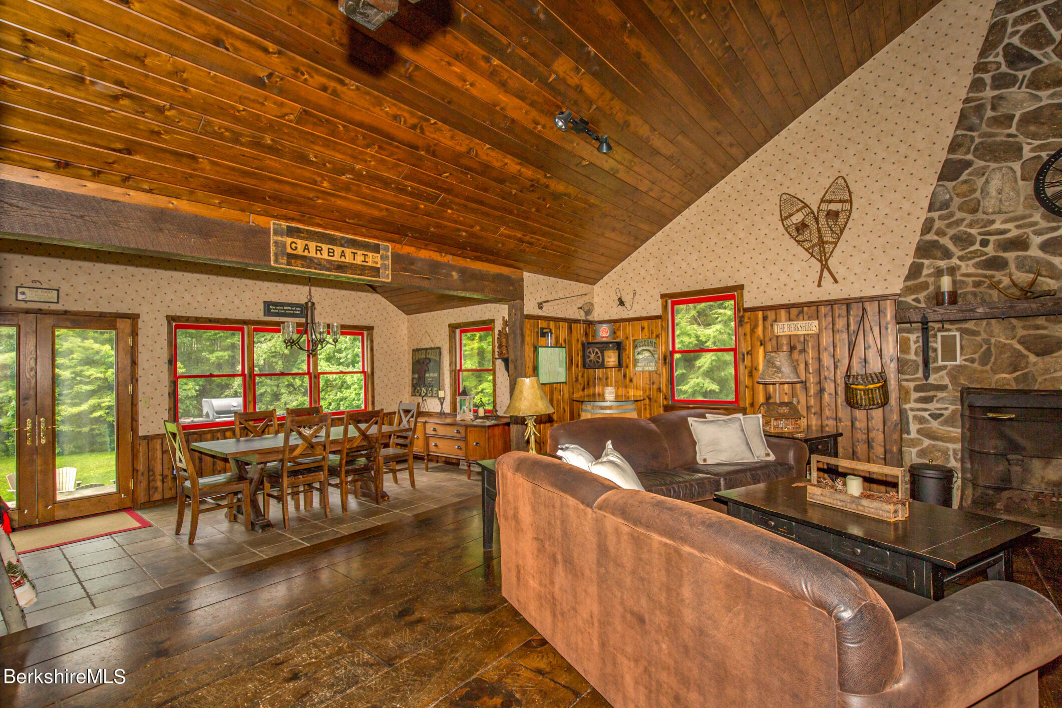 43 Becket Road Otis, MA 01029 - Photo 23 of 41 a living room with furniture and a large window