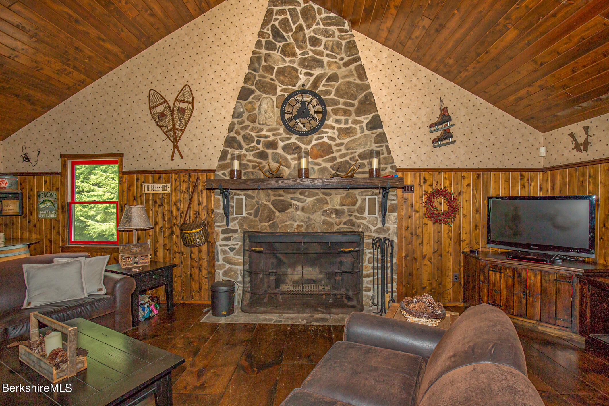 43 Becket Road Otis, MA 01029 - Photo 7 of 41 a living room with fireplace furniture and a flat screen tv