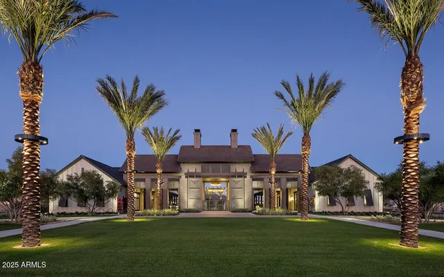 a front view of house with yard and outdoor seating