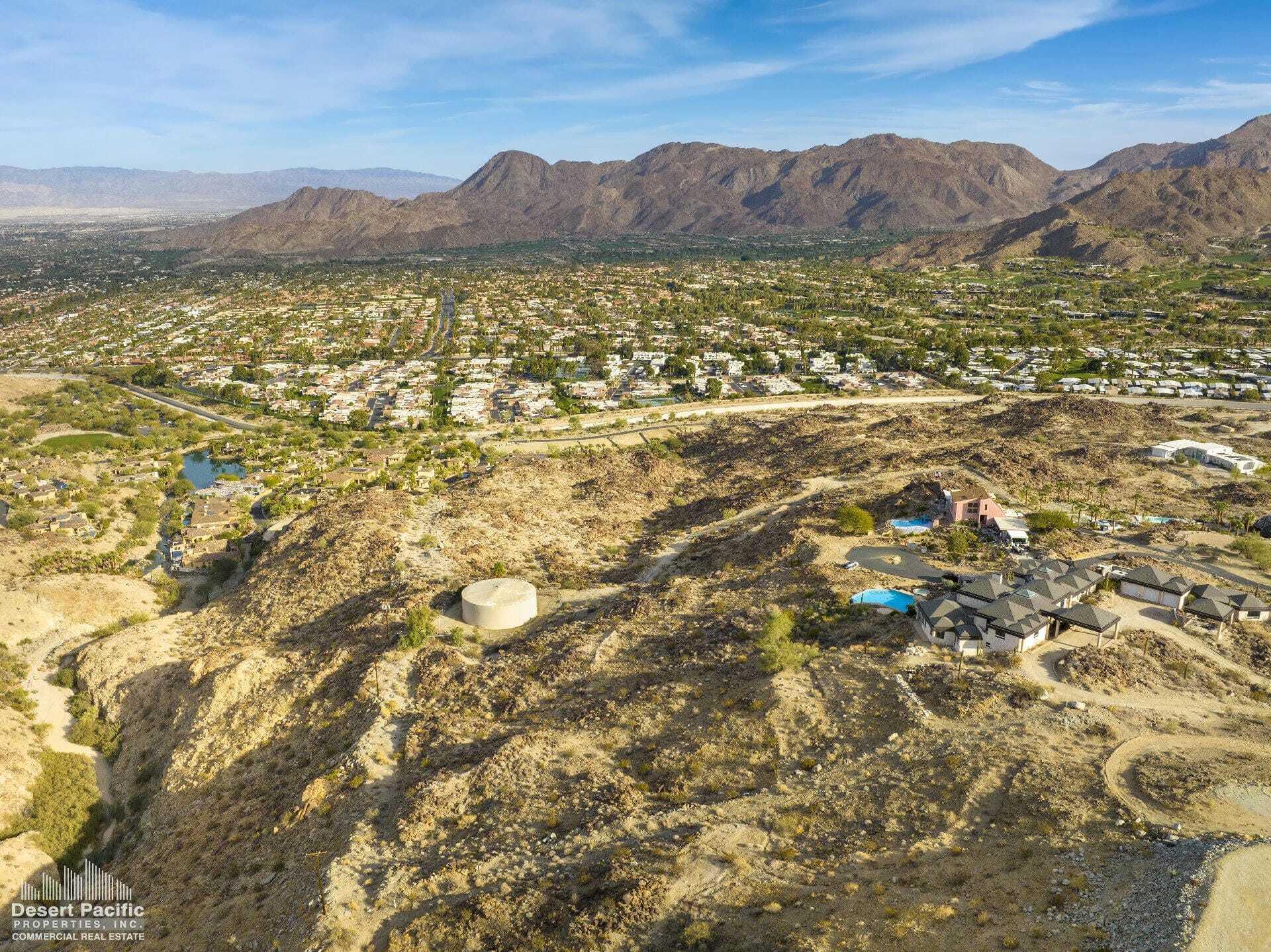 0 Paisano Road Palm Desert, CA 92260 - Photo 11 of 22 a view of a field with mountains in the background