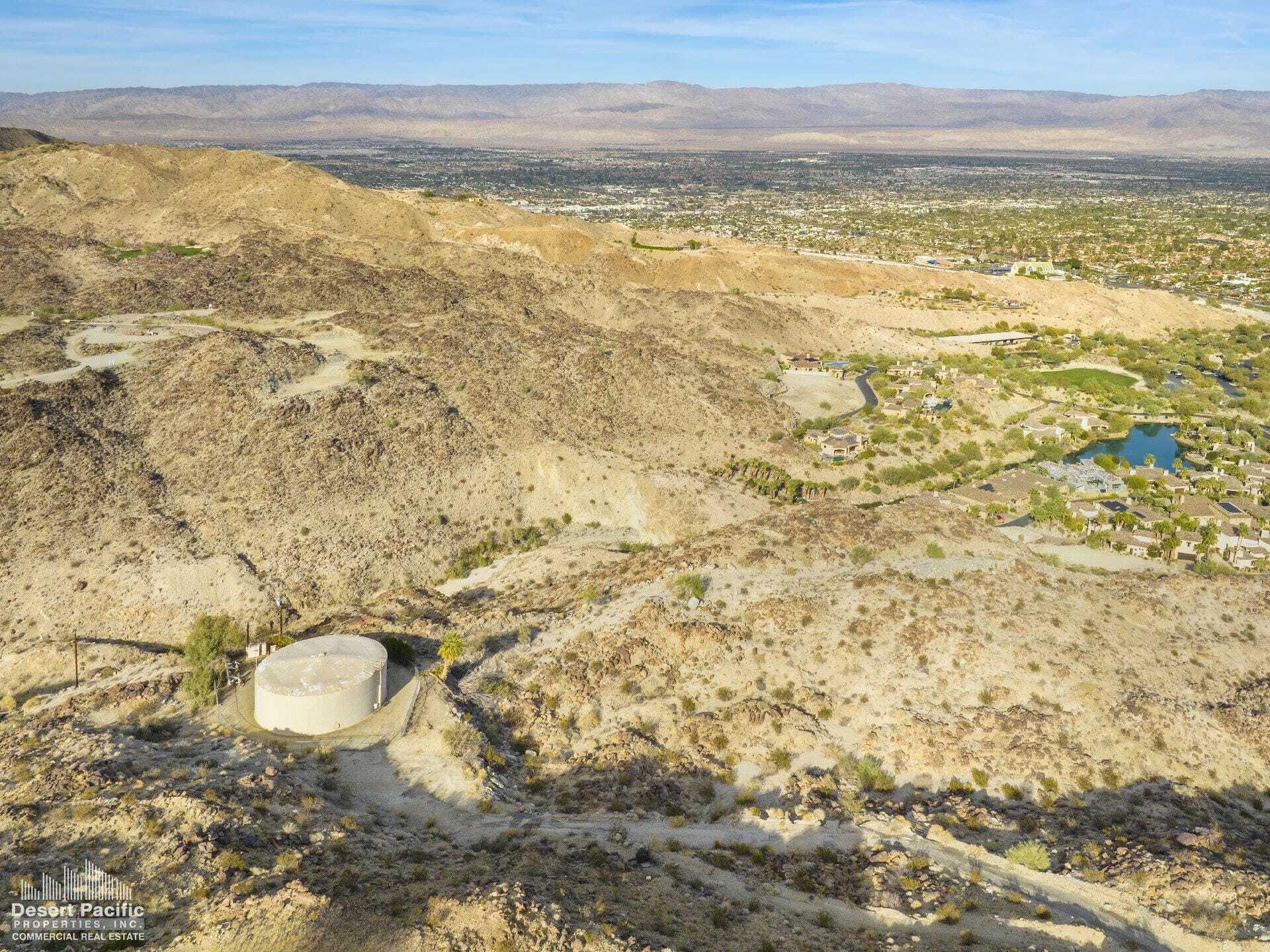 0 Paisano Road Palm Desert, CA 92260 - Photo 15 of 22 a bathroom with a toilet sink and shower