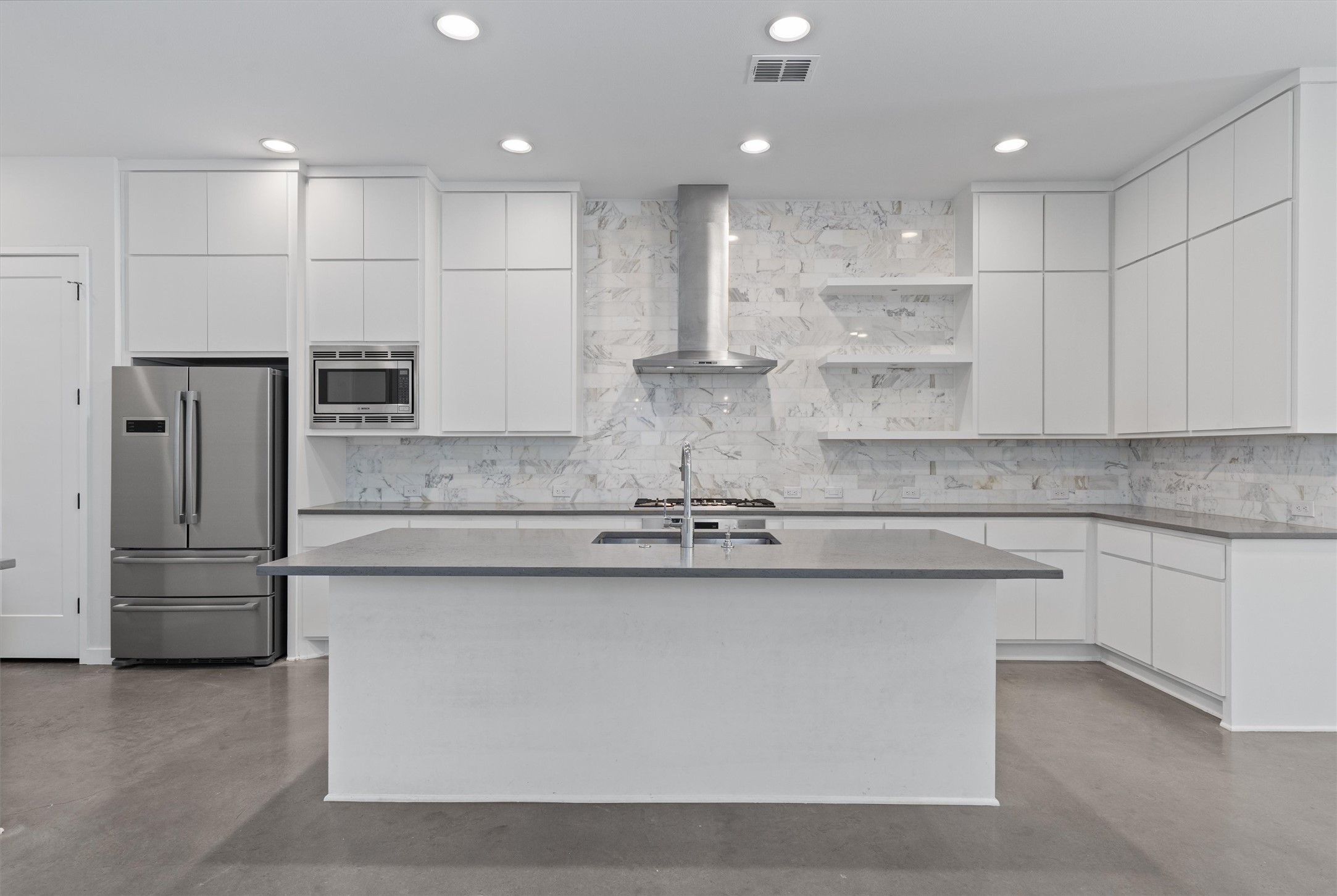 1107 Taulbee Lane, Unit B Austin, TX 78757 - Photo 6 of 37 Tons of storage and large kitchen island