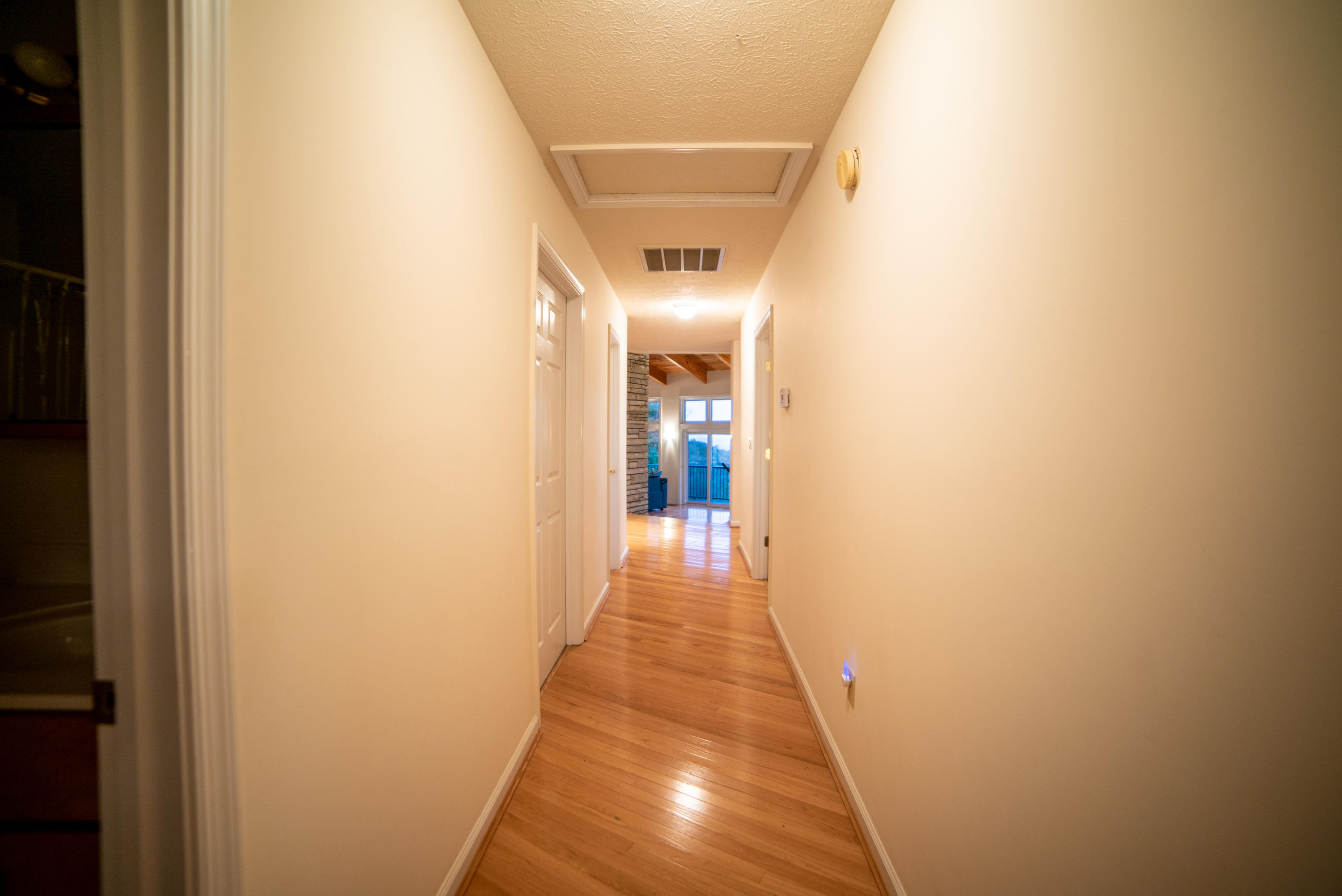 431 Russell Road Southeast Floyd, VA 24091 - Photo 14 of 32 a view of a hallway with wooden floor