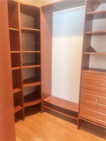 a bathroom with a tub sink and window