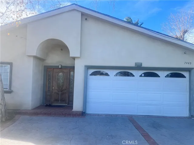 a view of gallery with wooden floor