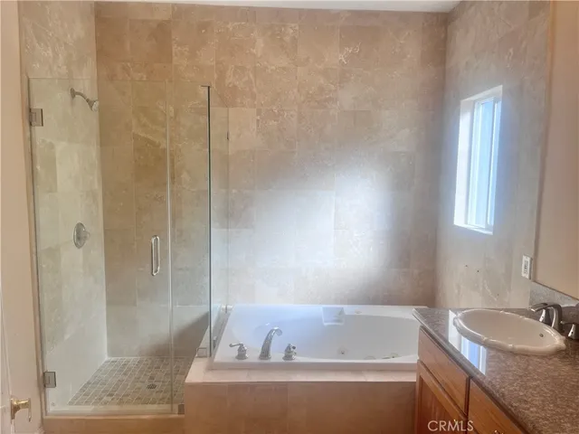 a view of a kitchen from a hallway