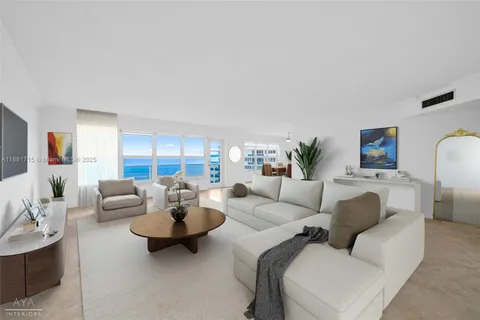 a living room with furniture and a table