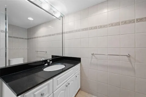 a view of a hallway with washer and dryer