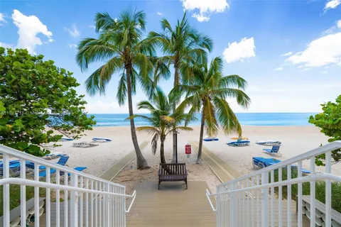 a view of a yard with a patio