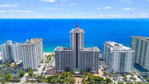 a view of a city with tall buildings