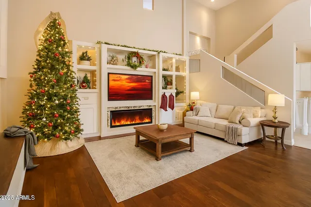 a spacious bathroom with a tub shower and mirror