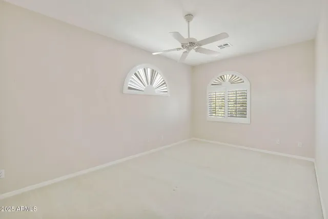 a bathroom with a sink double vanity and a tub