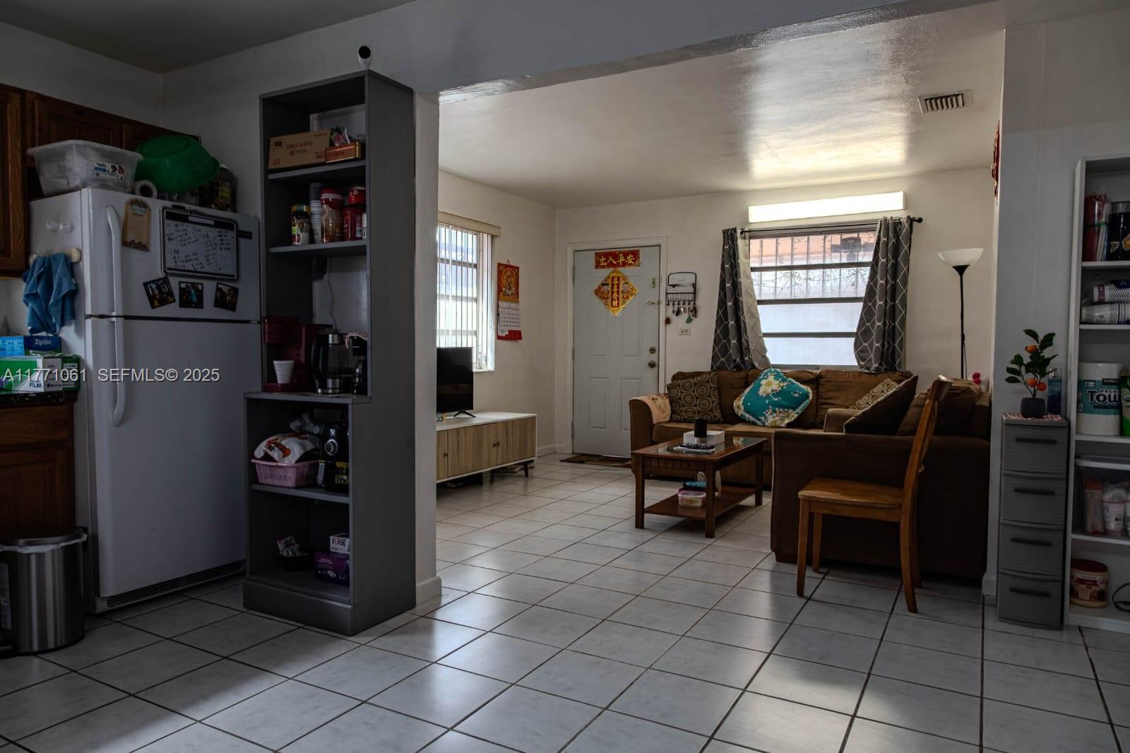 791 Northwest 22nd Place Miami, FL 33125 - Photo 22 of 33 a living room with furniture