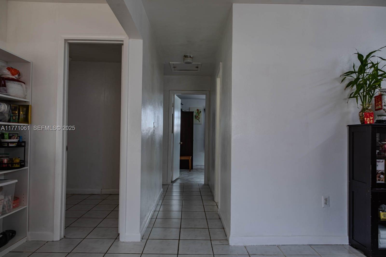 791 Northwest 22nd Place Miami, FL 33125 - Photo 24 of 33 a view of a hallway