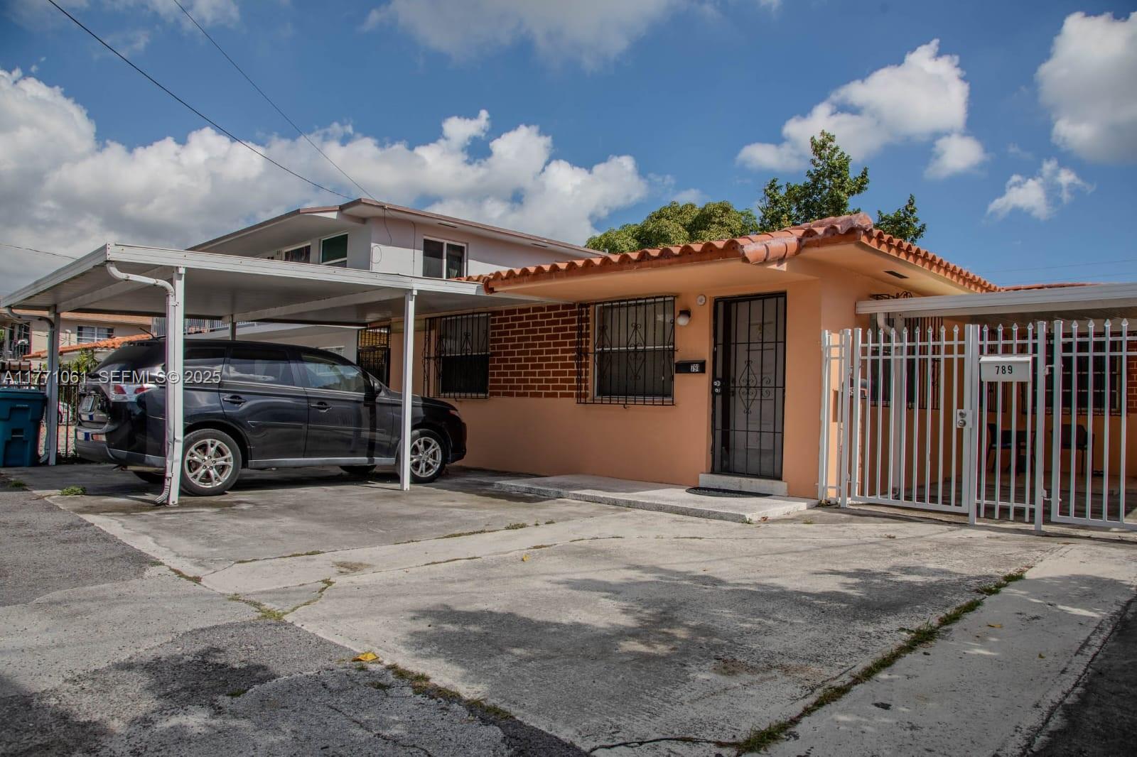 791 Northwest 22nd Place Miami, FL 33125 - Photo 3 of 33 a view of a car garage