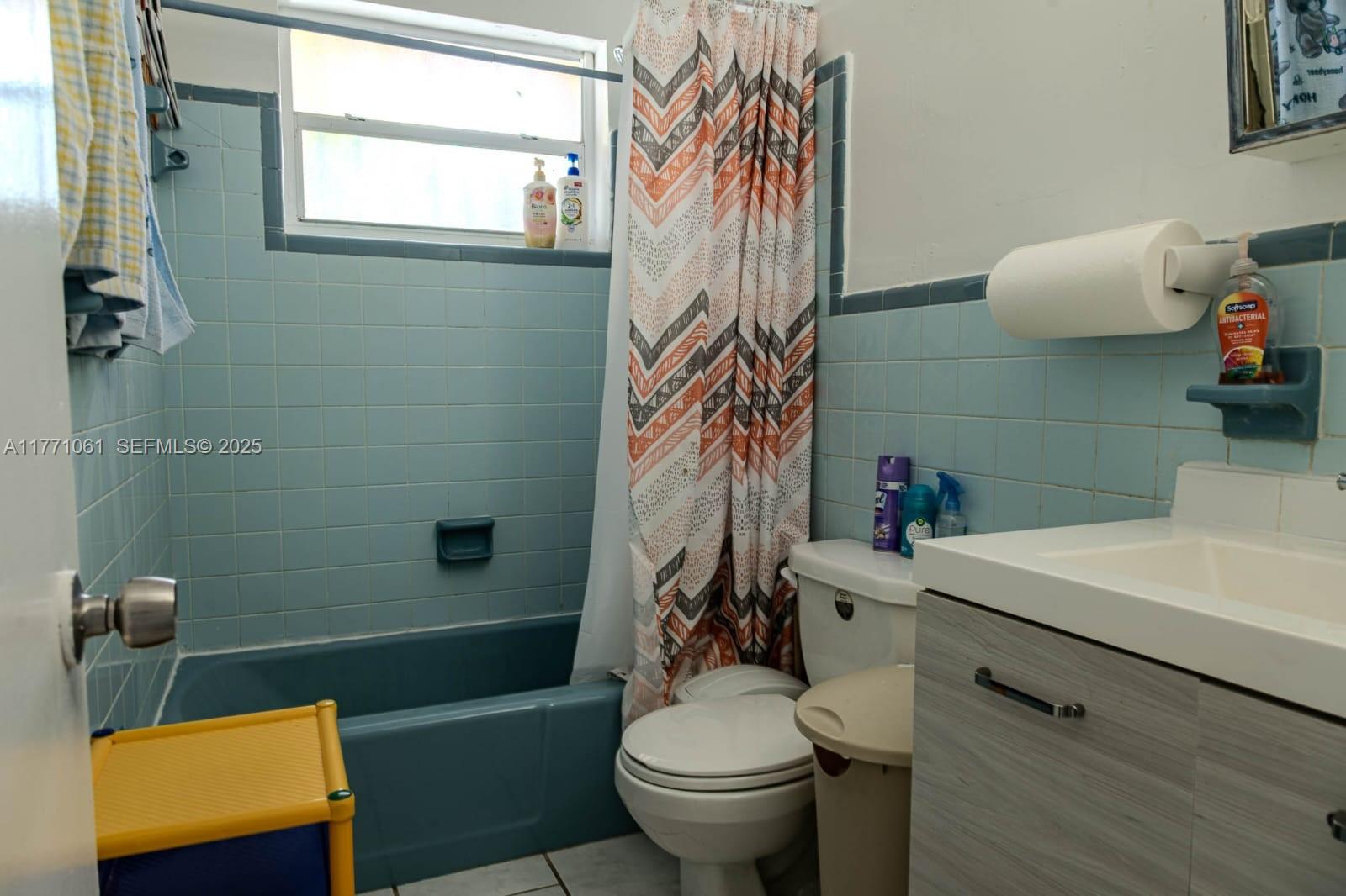 791 Northwest 22nd Place Miami, FL 33125 - Photo 31 of 33 a bathroom with a sink toilet and shower