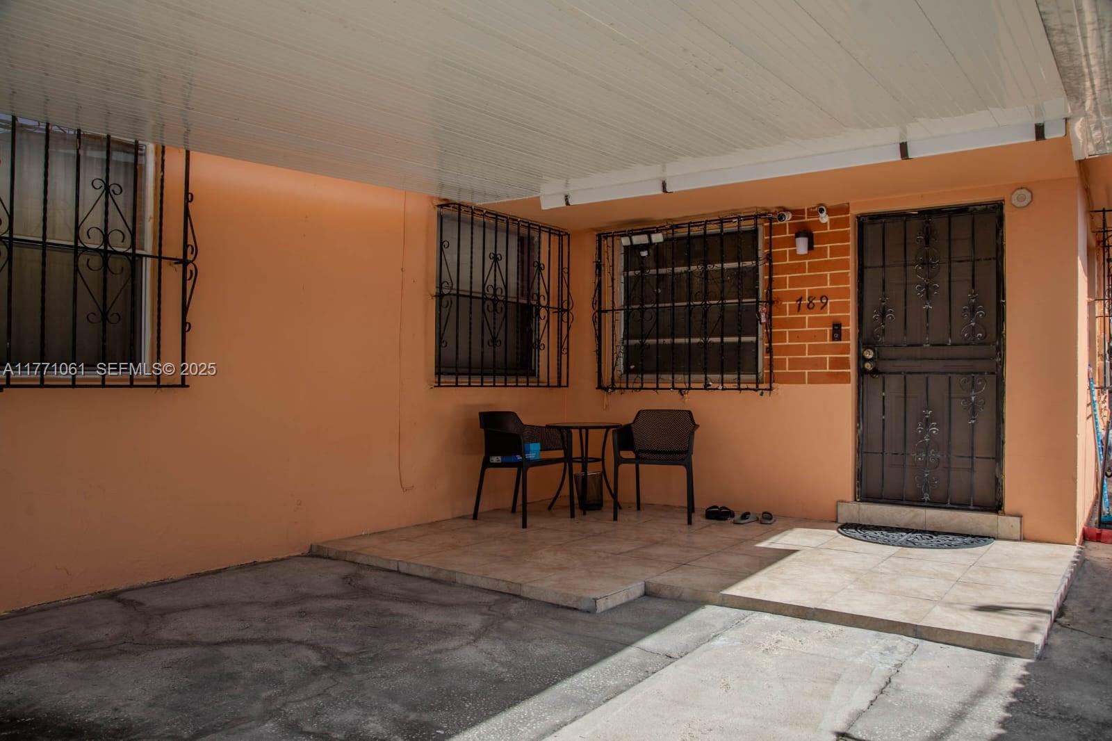 791 Northwest 22nd Place Miami, FL 33125 - Photo 7 of 33 a view of a livingroom with furniture and window