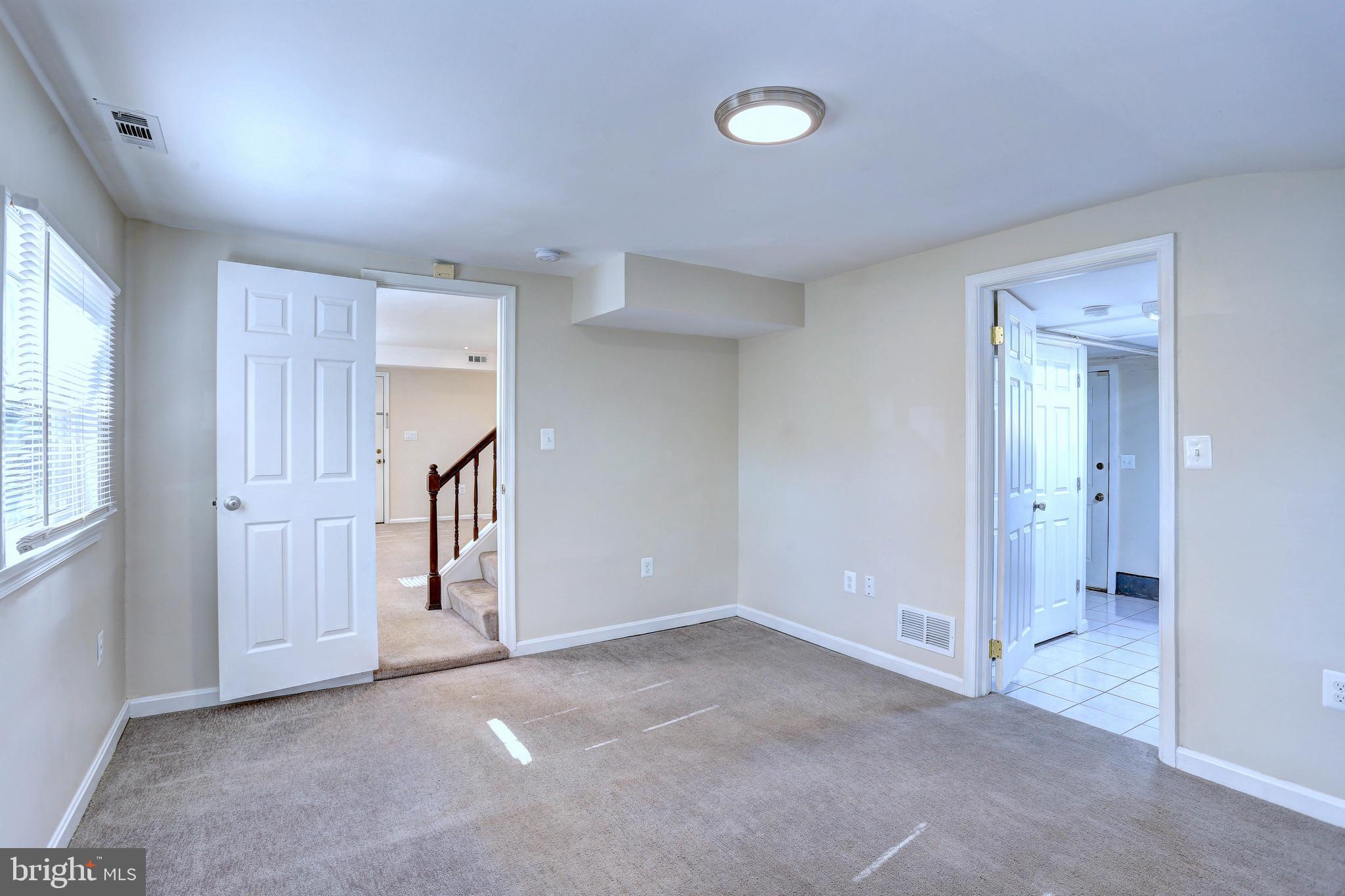 1222 Locust Avenue Halethorpe, MD 21227 - Photo 13 of 34 a view of an empty room with a window