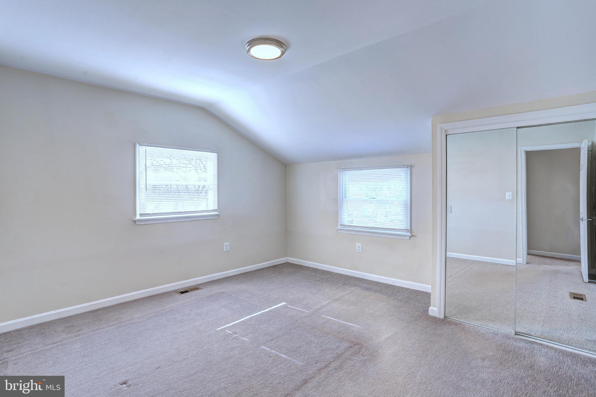 1222 Locust Avenue Halethorpe, MD 21227 - Photo 16 of 34 an empty room with windows