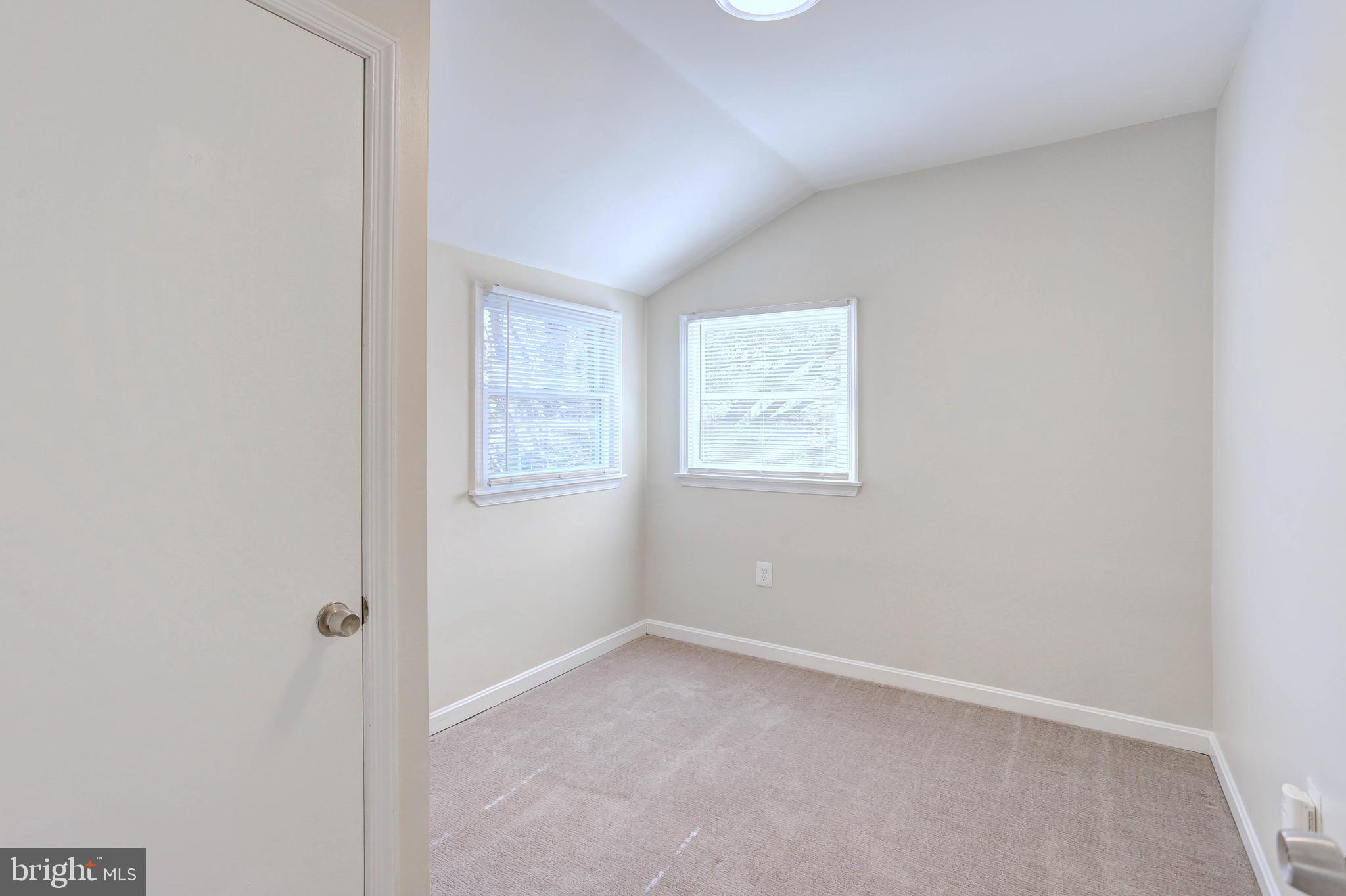 1222 Locust Avenue Halethorpe, MD 21227 - Photo 19 of 34 an empty room with windows