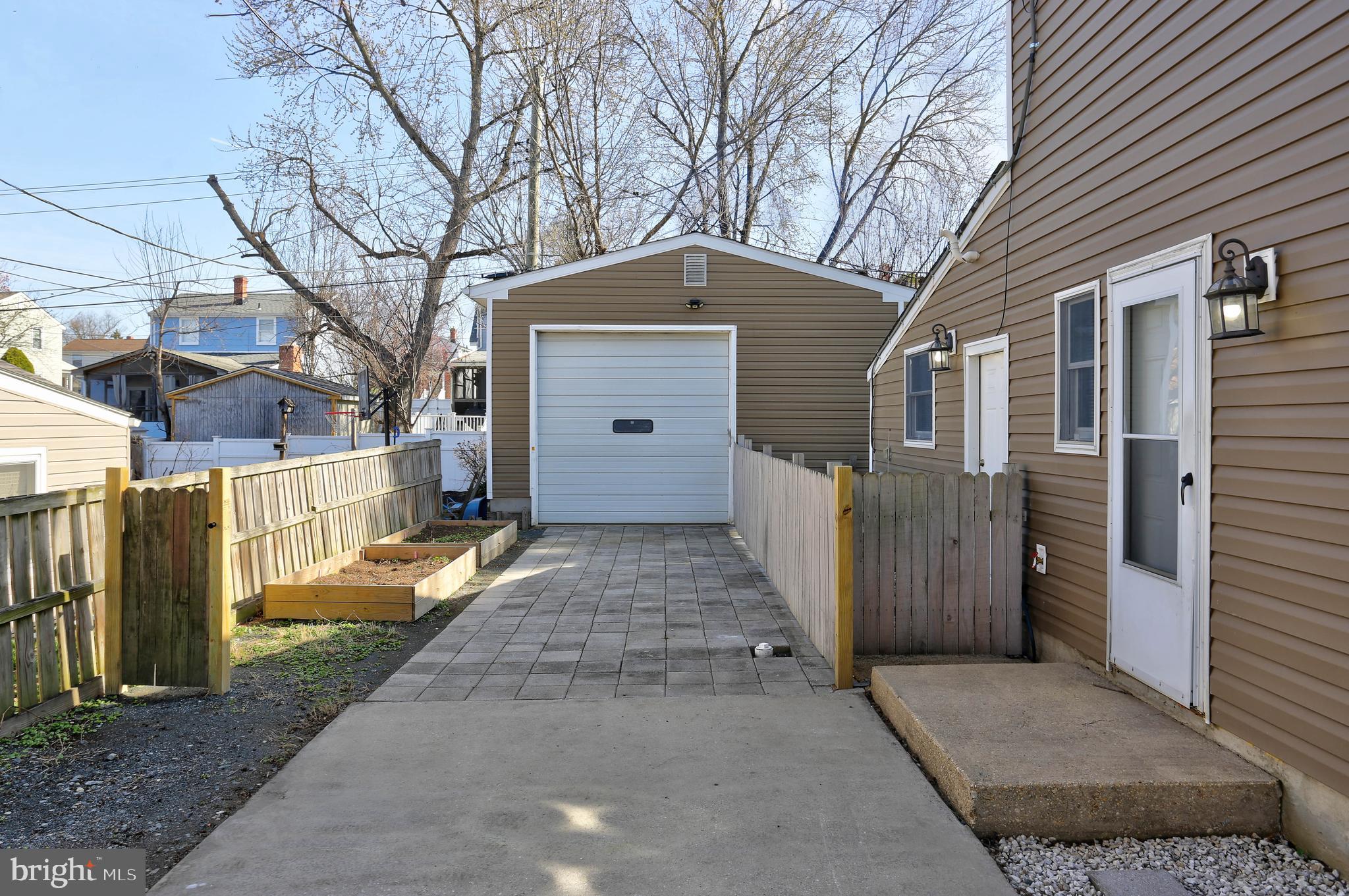 1222 Locust Avenue Halethorpe, MD 21227 - Photo 2 of 34 a view of a house with a yard