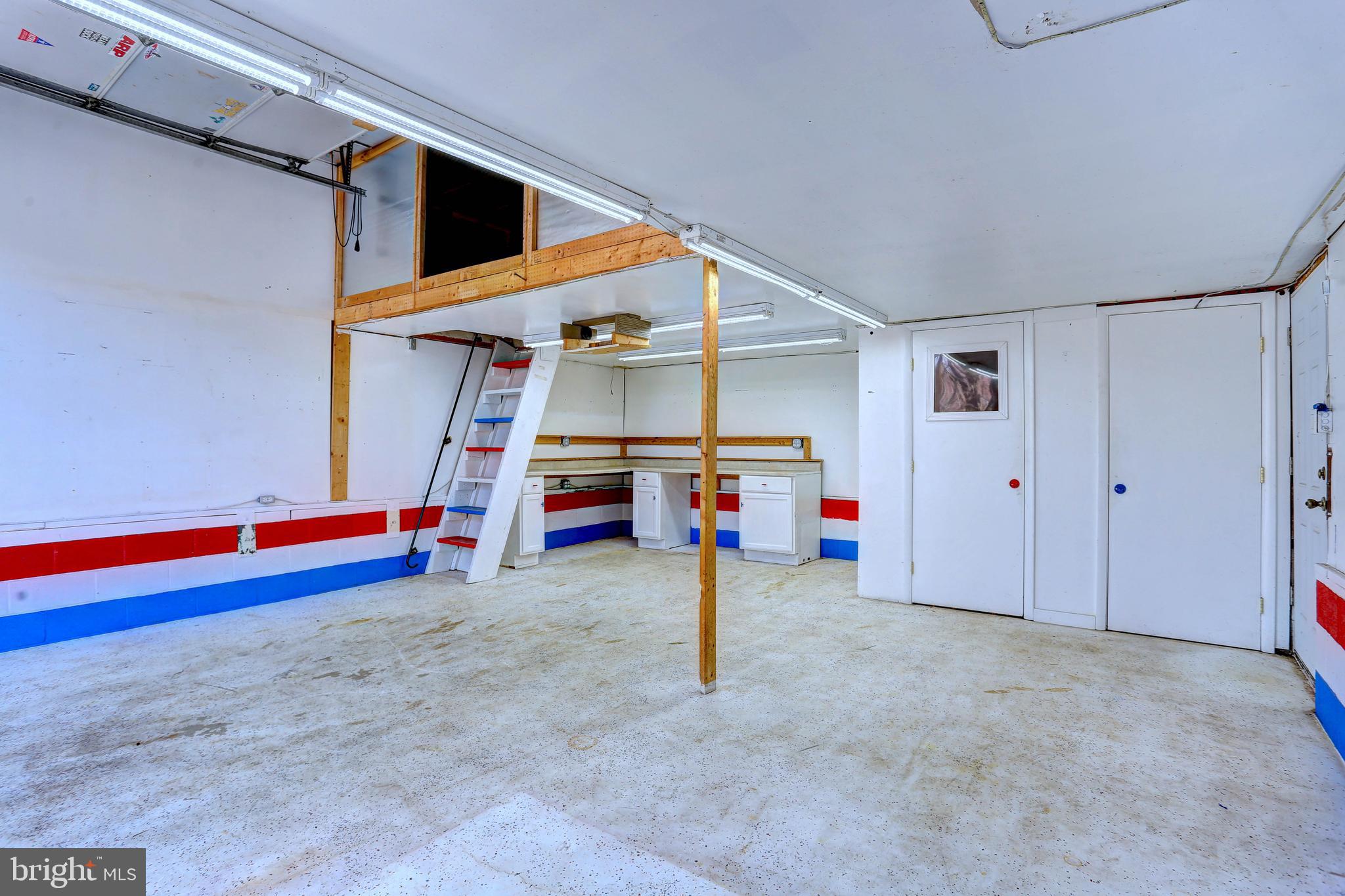 1222 Locust Avenue Halethorpe, MD 21227 - Photo 23 of 34 a view of a big room with air conditioner duct and materials on a floor