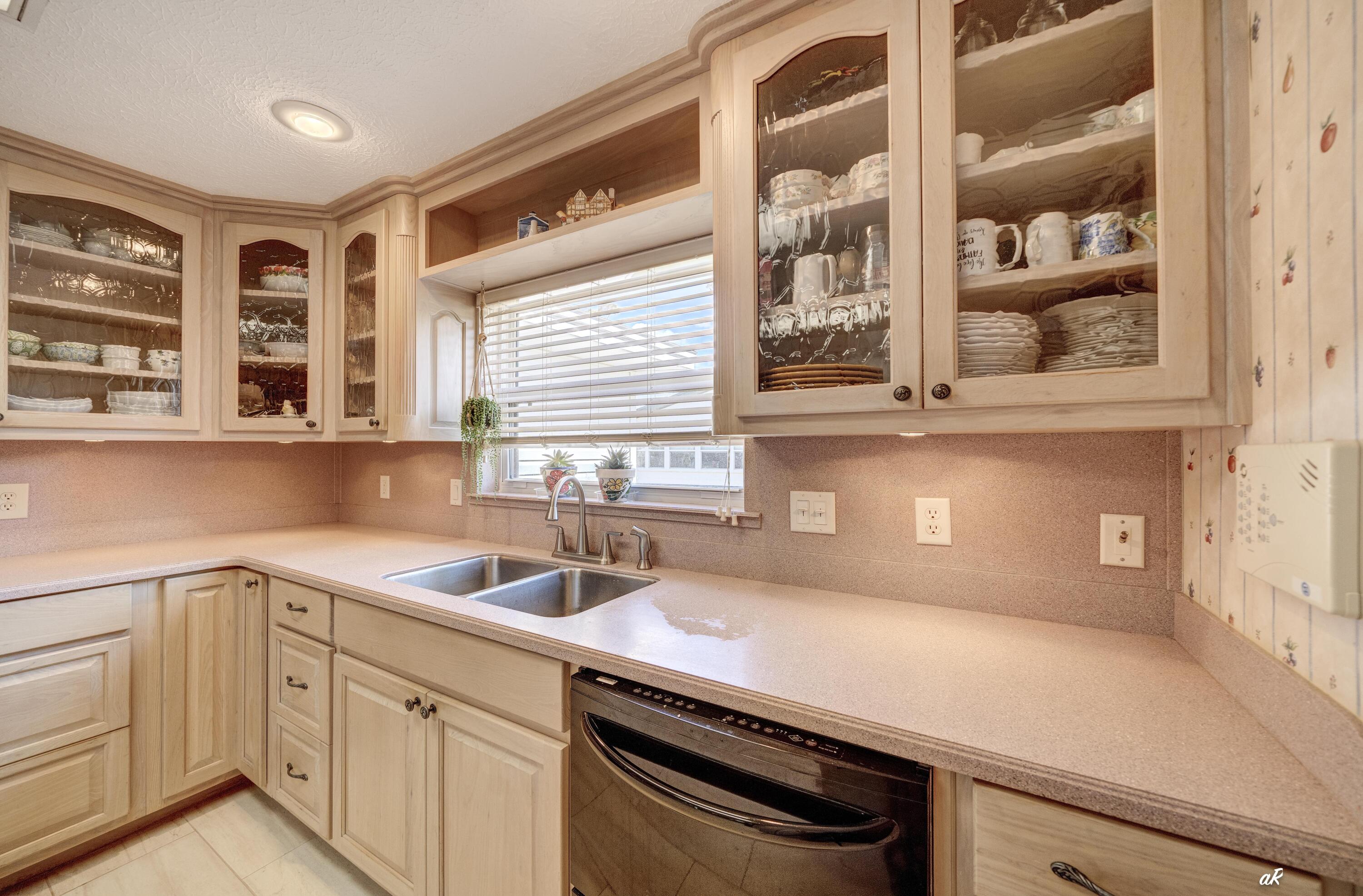 2910 Kings Harbour Road Panama City, FL 32405 - Photo 13 of 50 a kitchen with a sink and a window