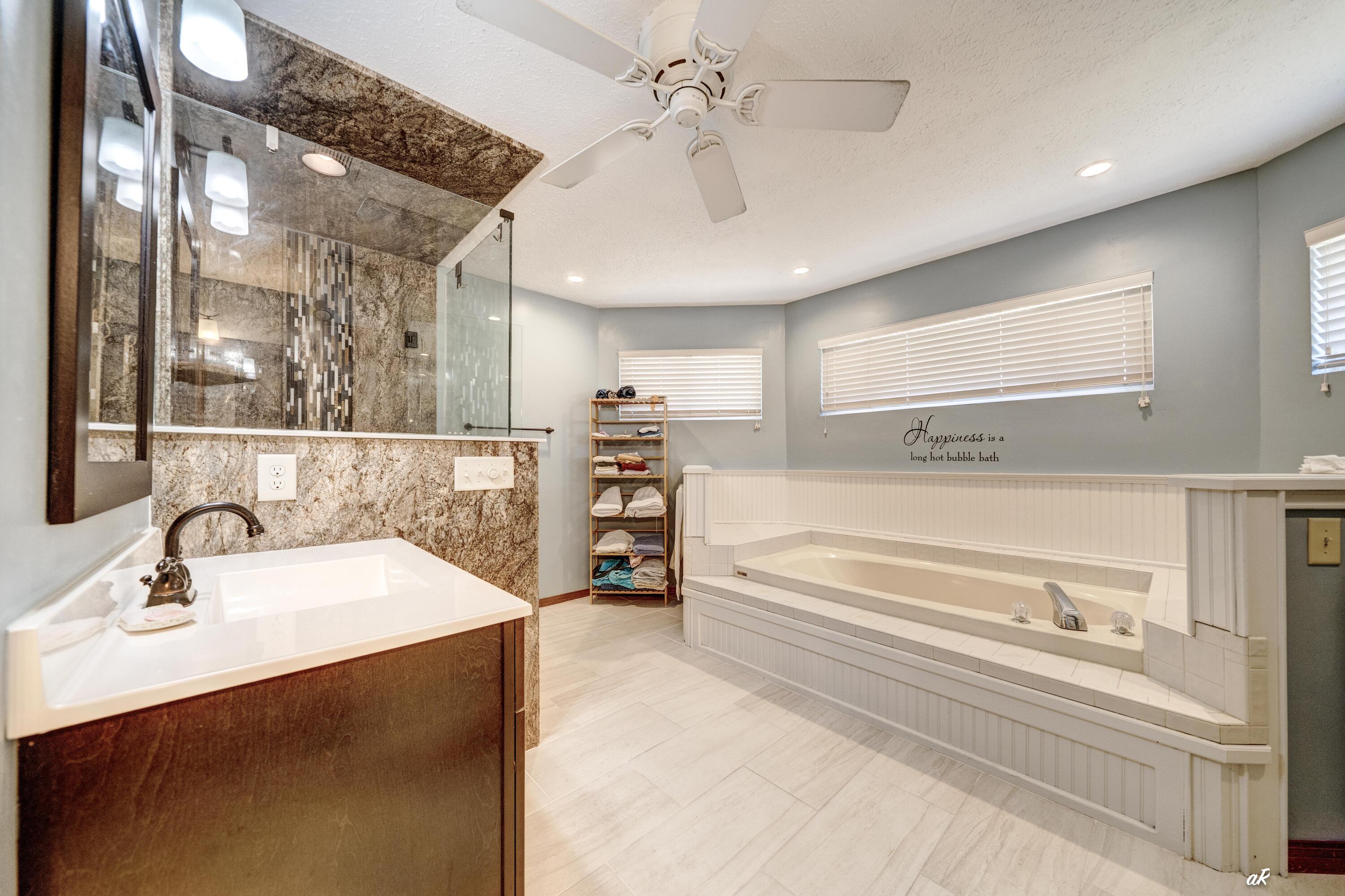 2910 Kings Harbour Road Panama City, FL 32405 - Photo 26 of 50 a spacious bathroom with a sink double vanity and a mirror