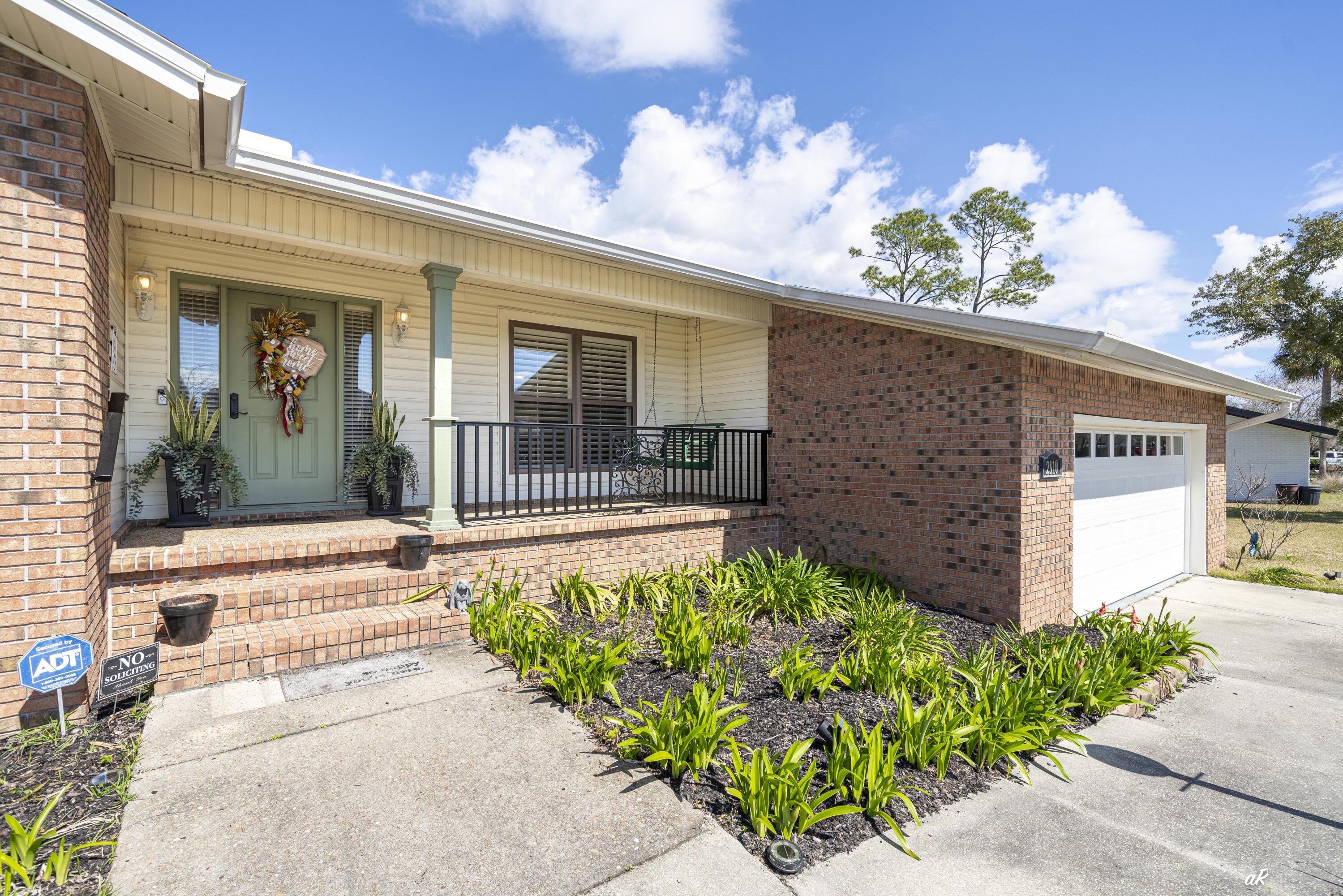 2910 Kings Harbour Road Panama City, FL 32405 - Photo 3 of 50 a front view of a house