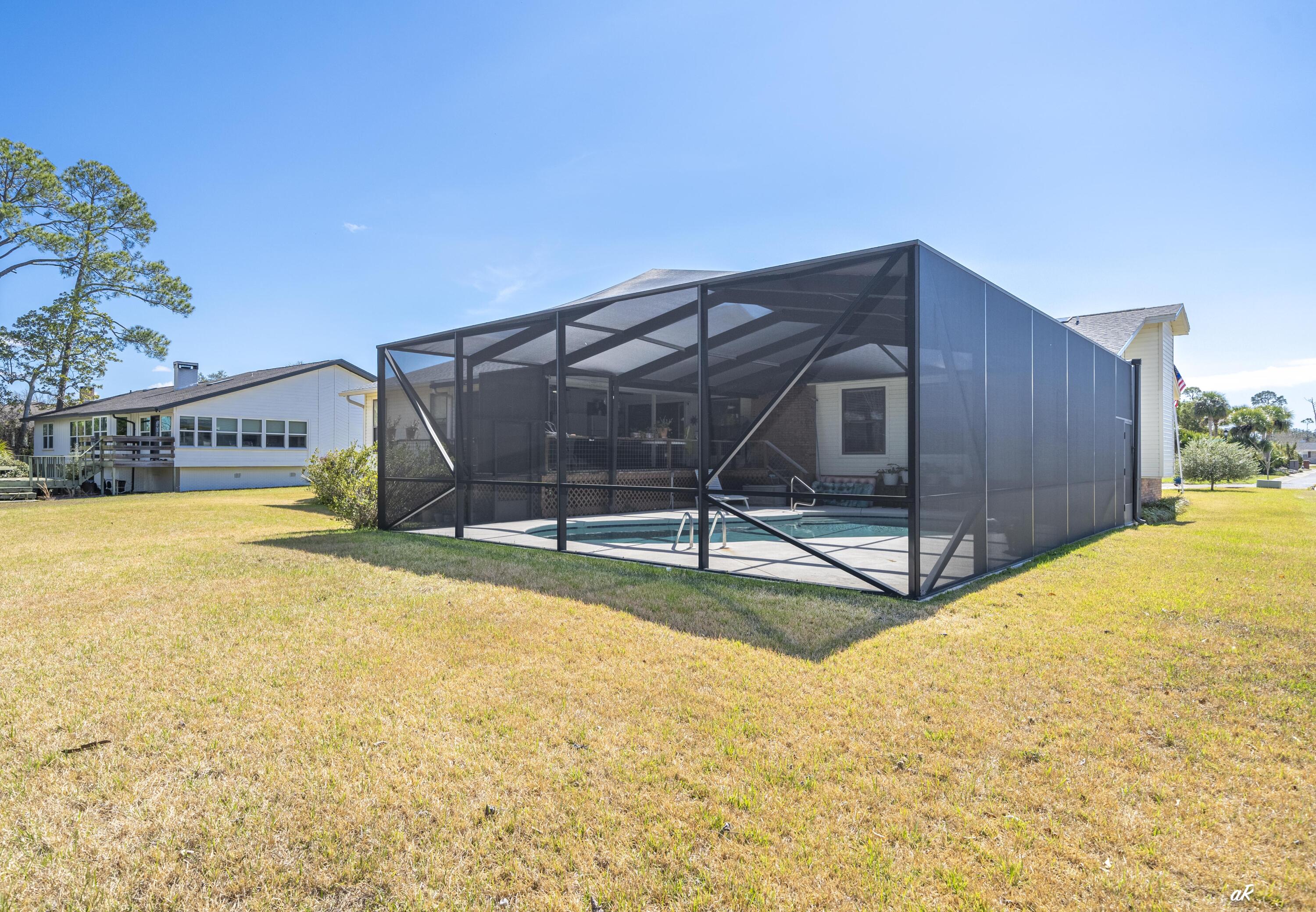 2910 Kings Harbour Road Panama City, FL 32405 - Photo 38 of 50 a view of a backyard