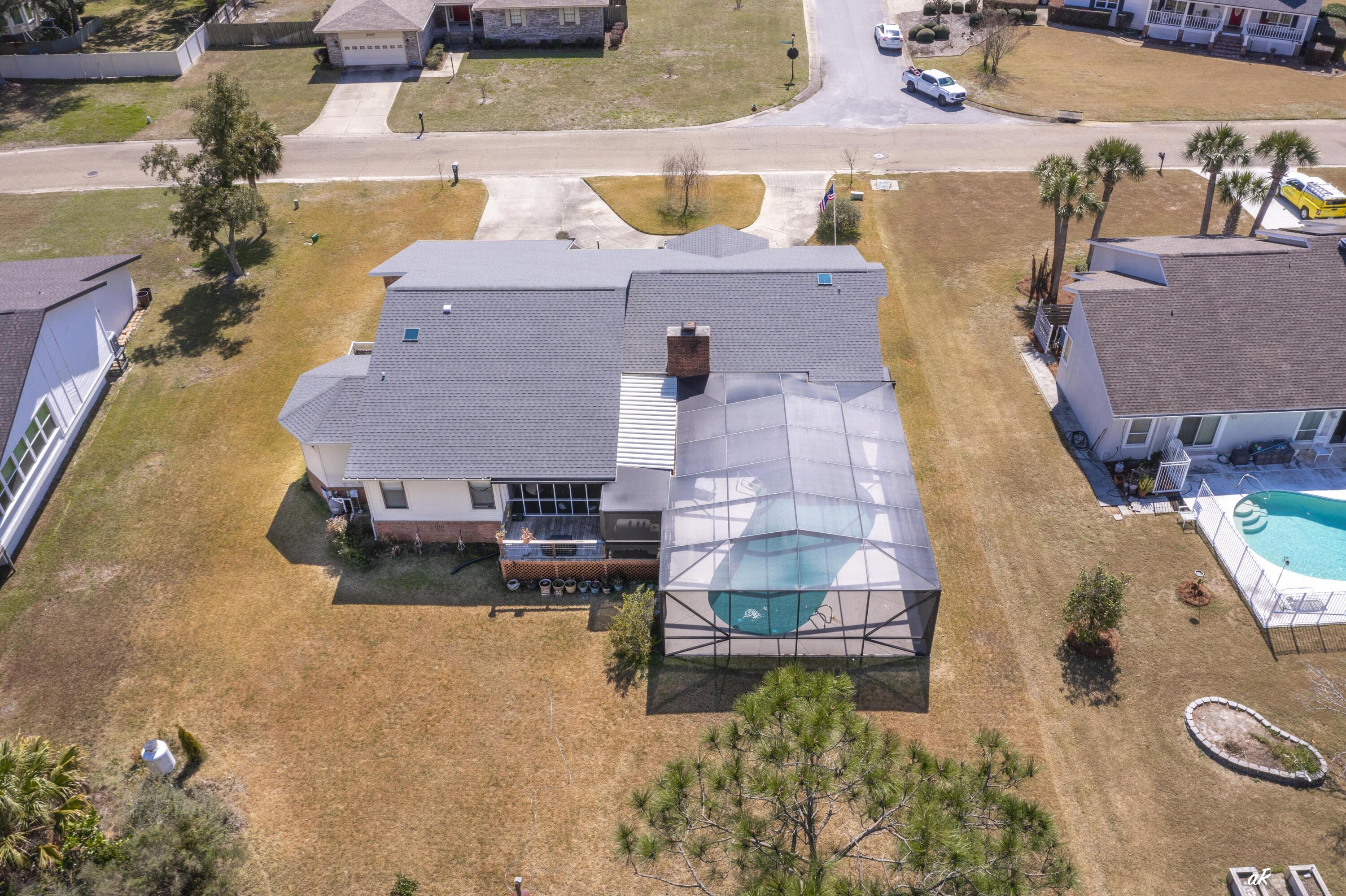 2910 Kings Harbour Road Panama City, FL 32405 - Photo 42 of 50 an aerial view of a house with swimming pool