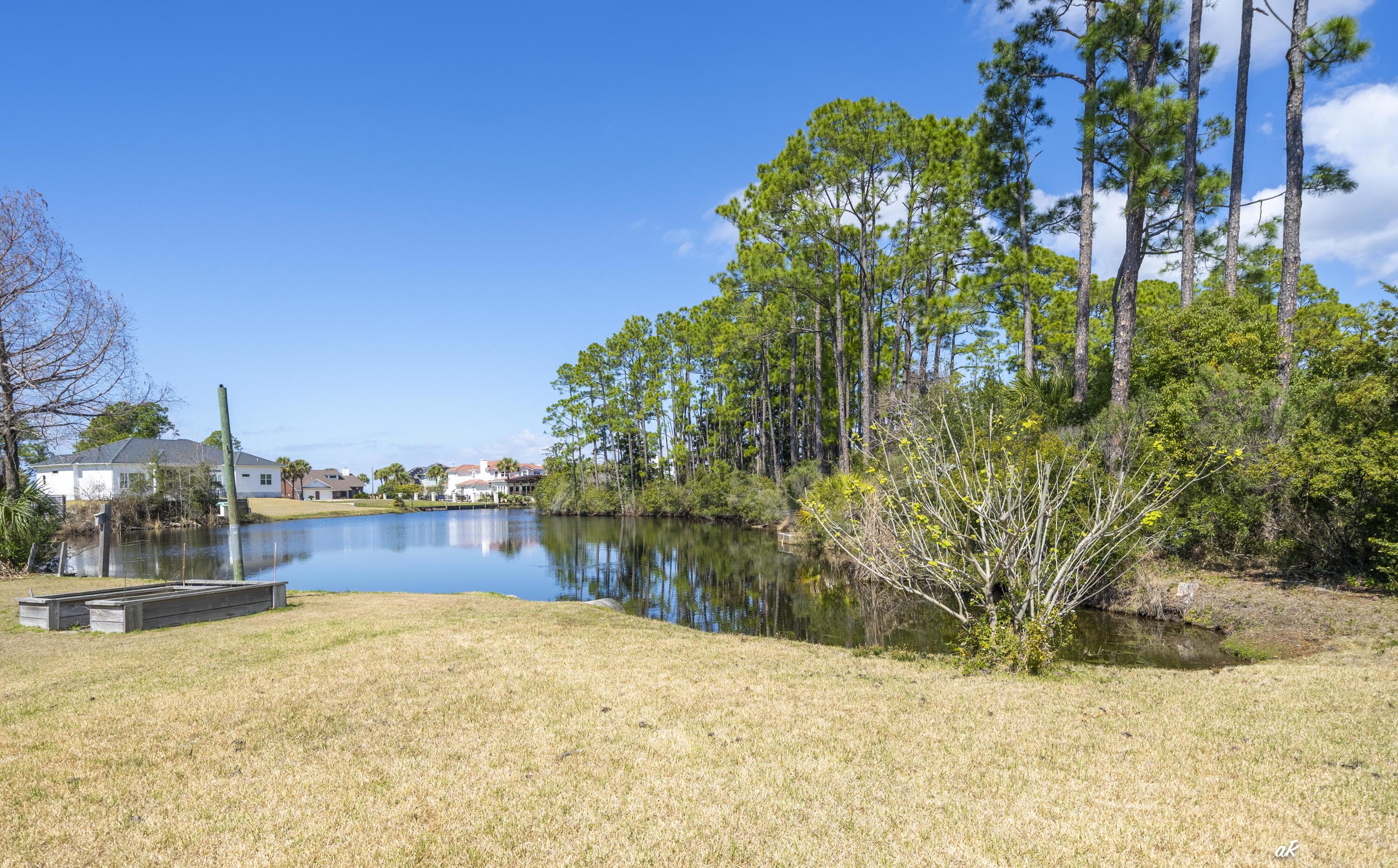 2910 Kings Harbour Road Panama City, FL 32405 - Photo 43 of 50 a view of large tree with wooden fence