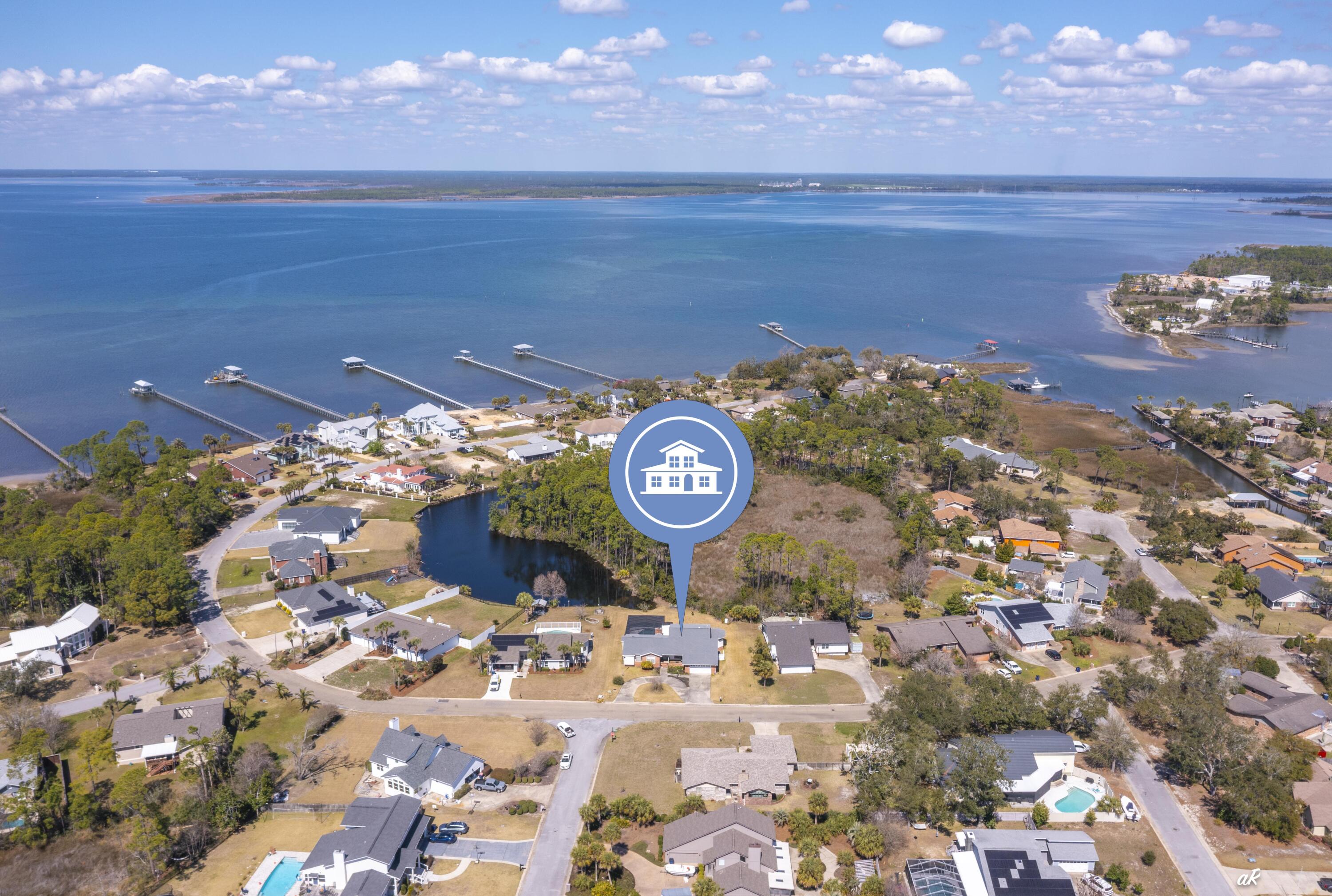 2910 Kings Harbour Road Panama City, FL 32405 - Photo 46 of 50 a view of a lake with an outdoor space