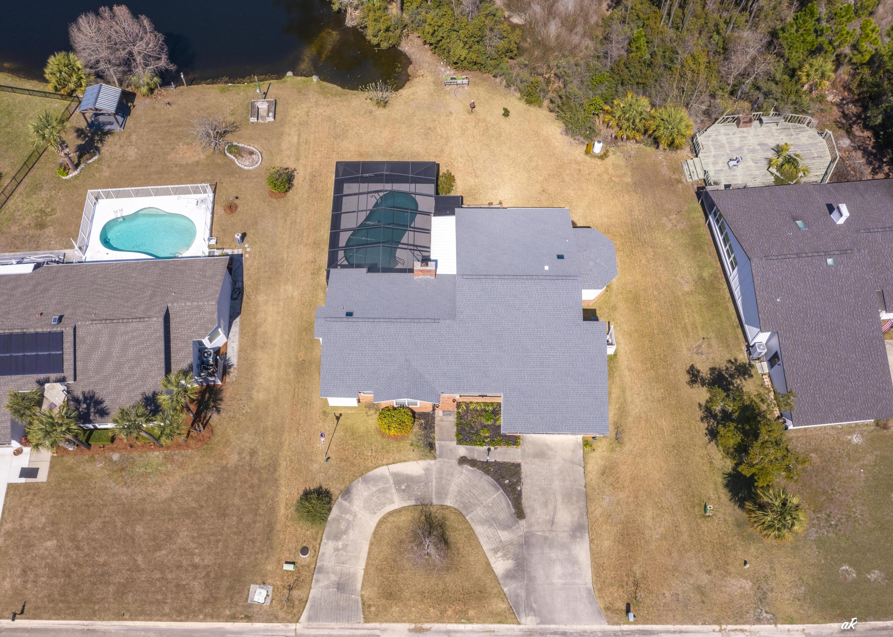 2910 Kings Harbour Road Panama City, FL 32405 - Photo 48 of 50 an aerial view of a house with a yard