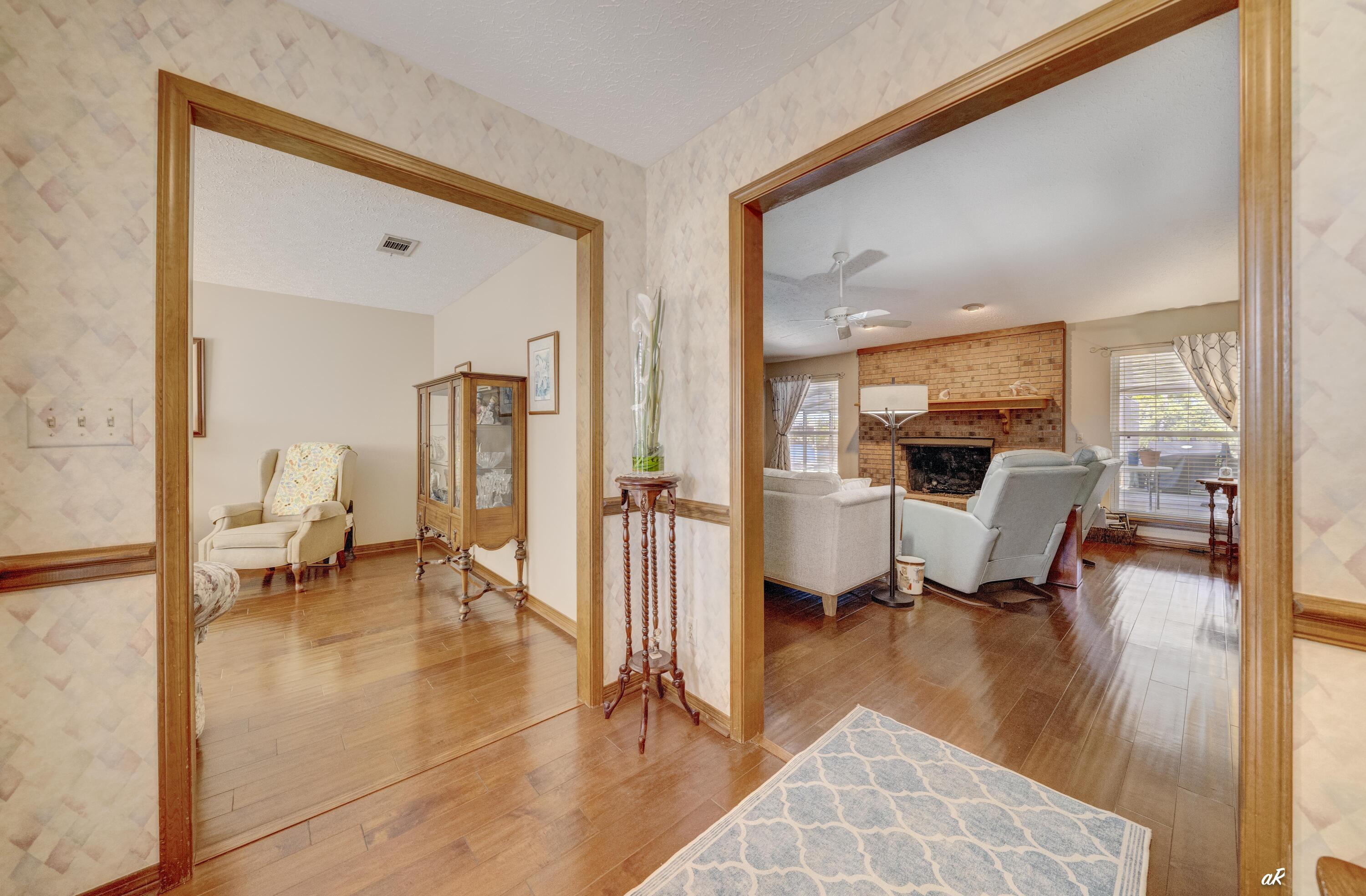 2910 Kings Harbour Road Panama City, FL 32405 - Photo 6 of 50 a view of living room with furniture and floor to ceiling window