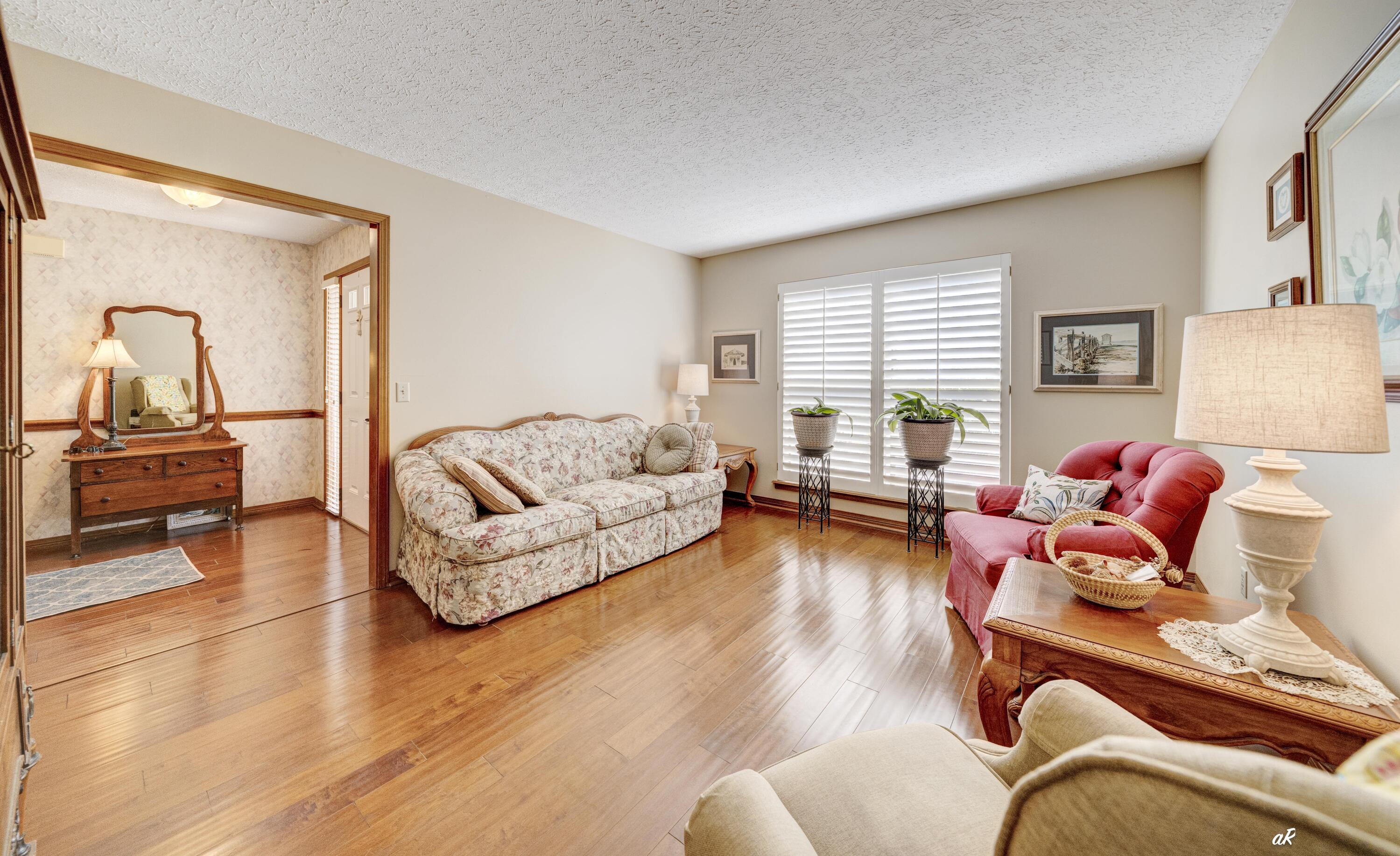 2910 Kings Harbour Road Panama City, FL 32405 - Photo 9 of 50 a living room with furniture and a large window