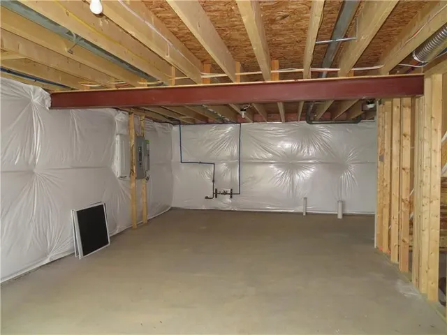 a view of a grassy field with trees