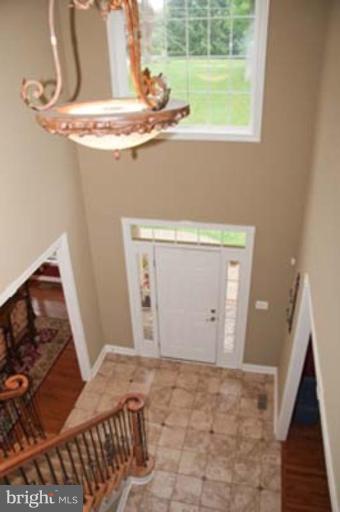 14616 Manor Road Phoenix, MD 21131 - Photo 2 of 30 a view of a livingroom with wooden floor and a window