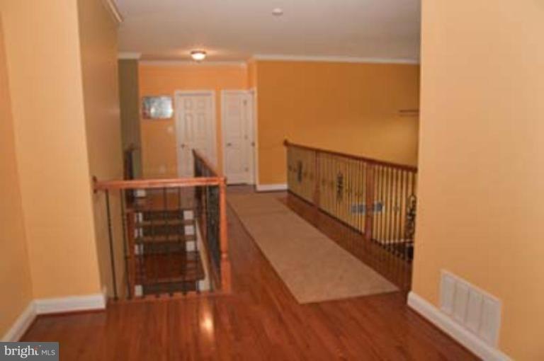 14616 Manor Road Phoenix, MD 21131 - Photo 23 of 30 a view of entryway with wooden floor